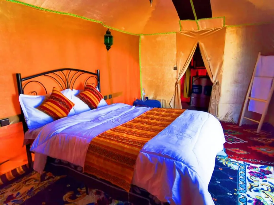 Bed in Merzouga Luxury Camp