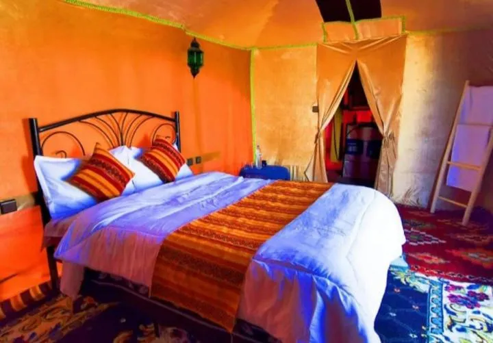 Bed in Merzouga Luxury Camp