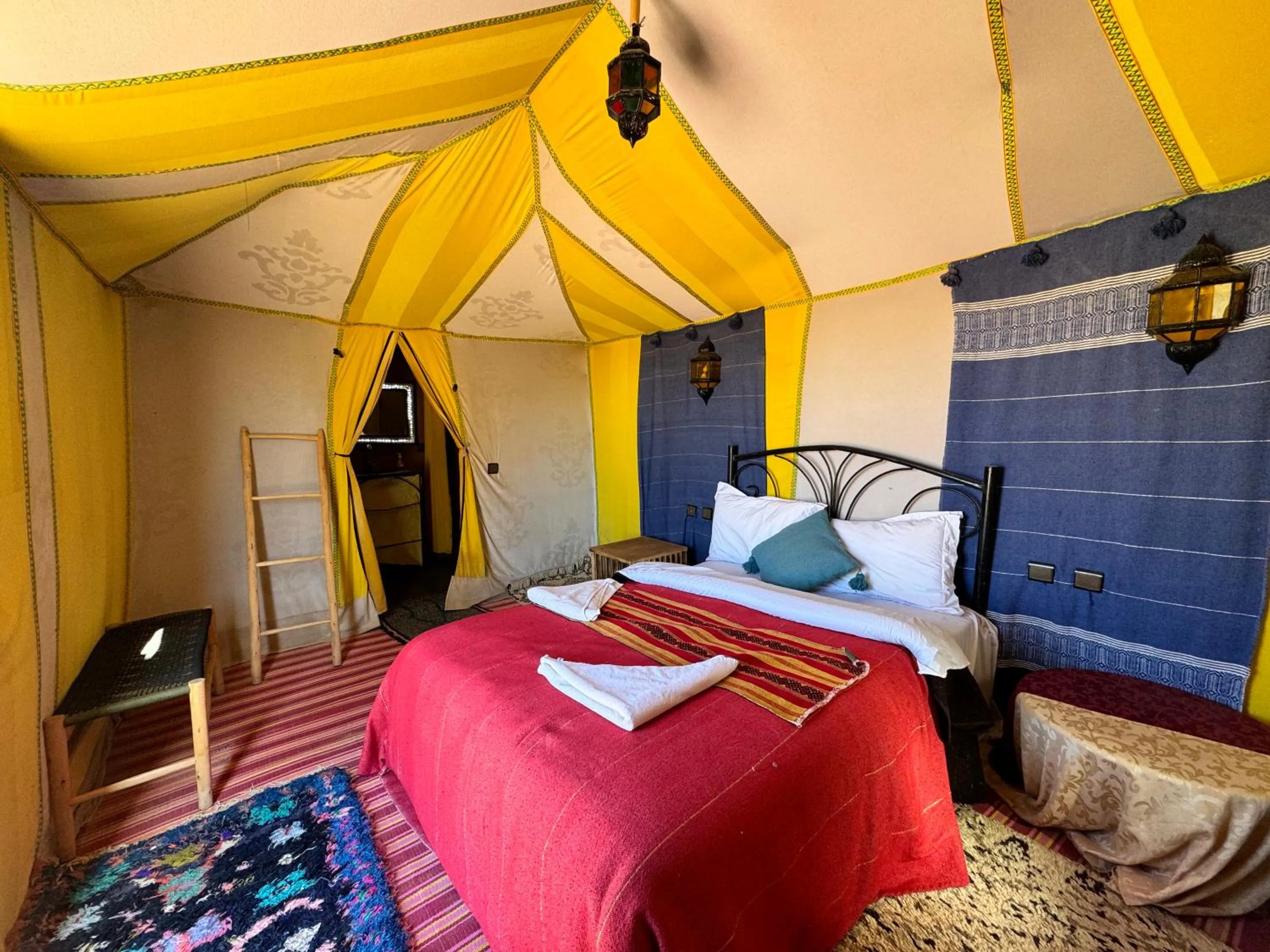 Bed in Merzouga Luxury Camp