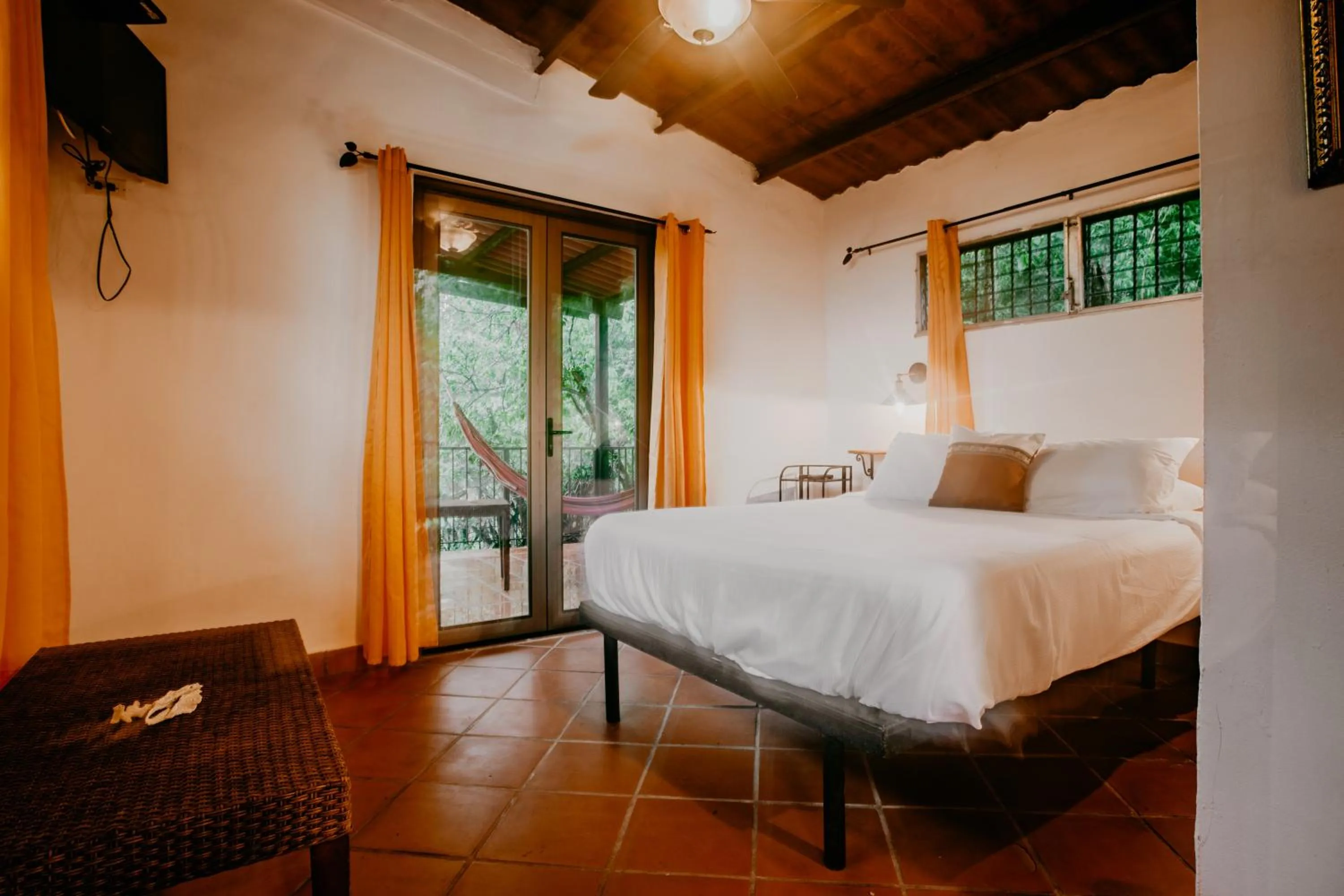 Bed in The Golden Frog Inn