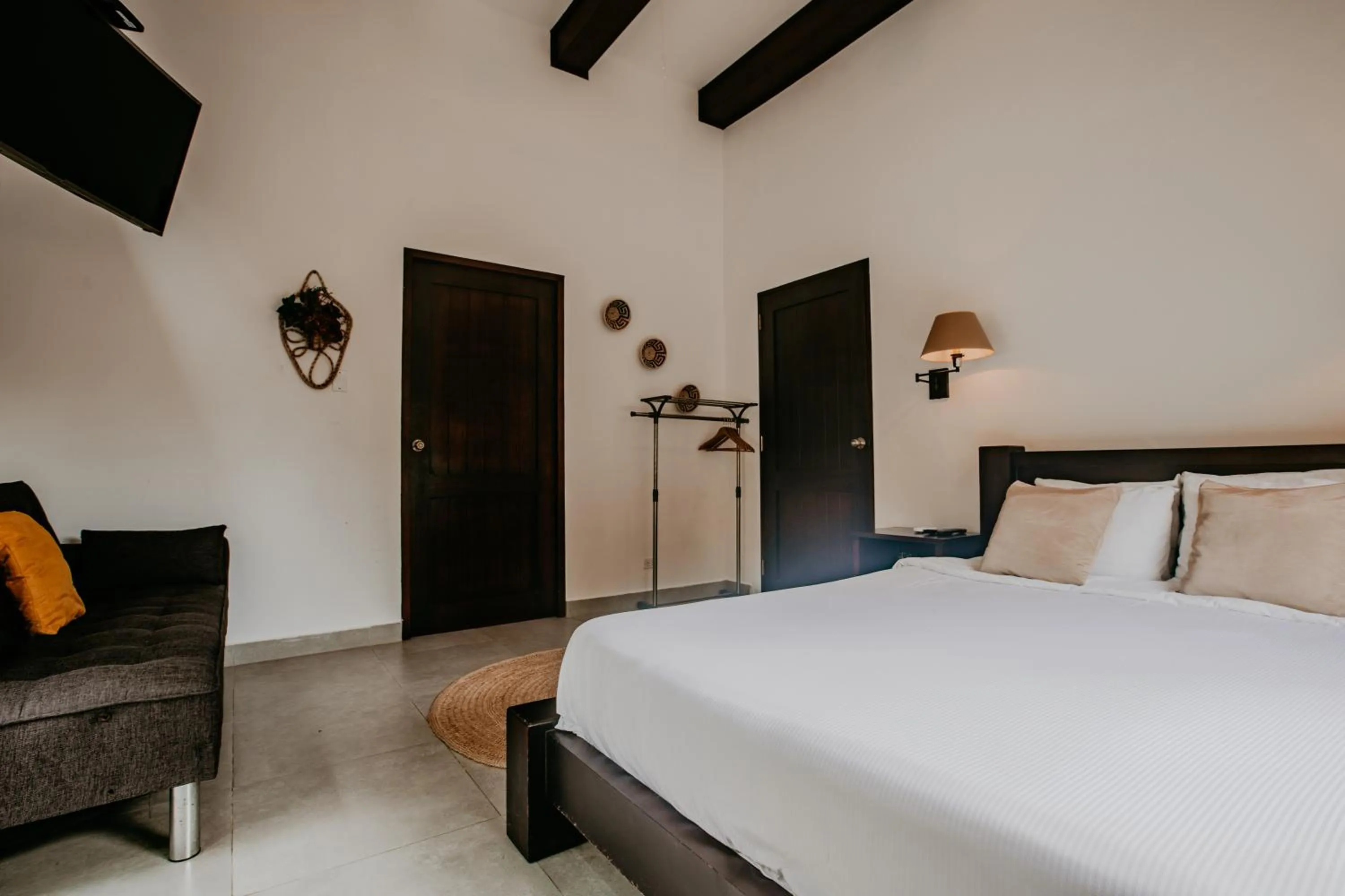 Bed in The Golden Frog Inn