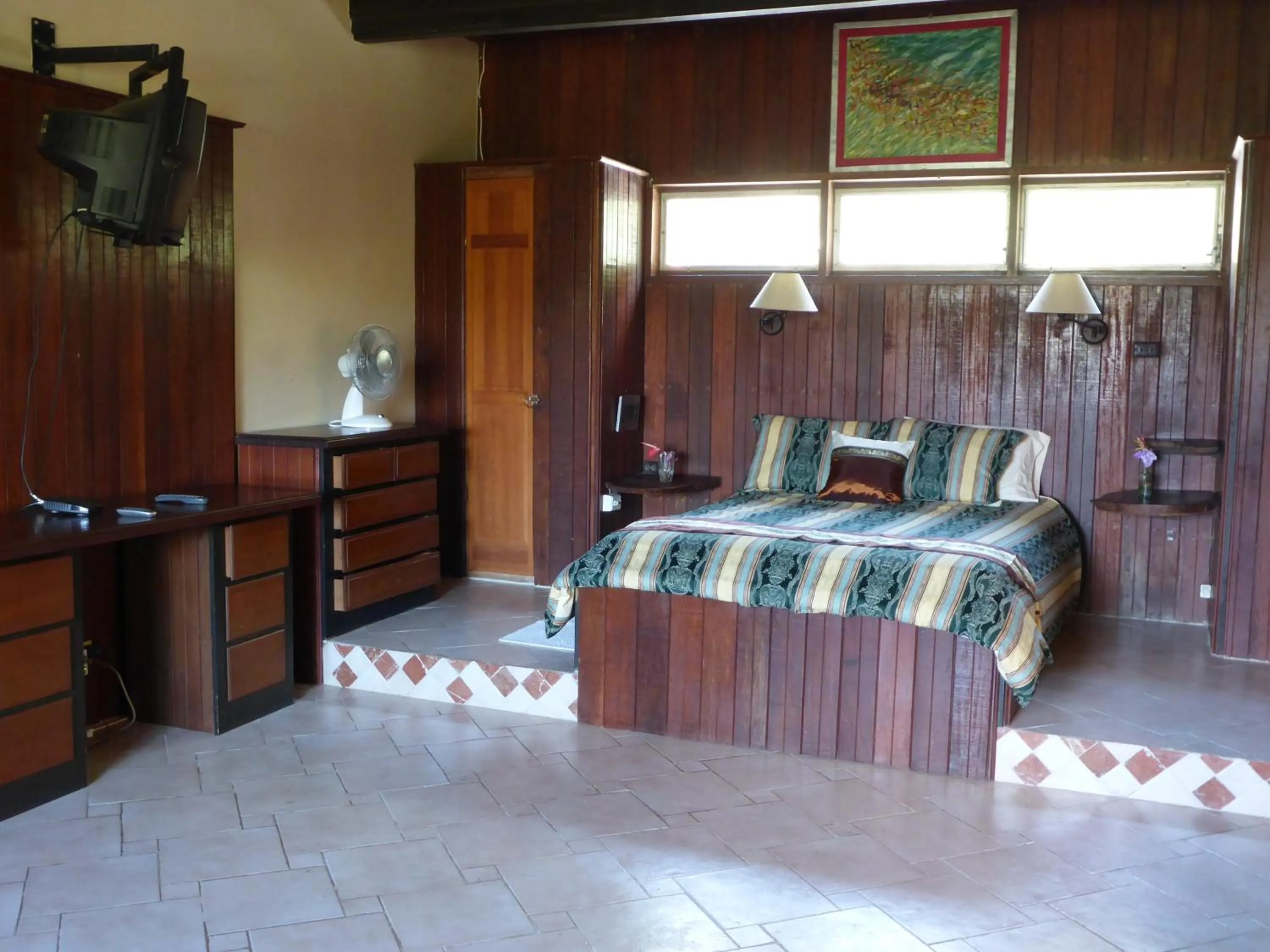 Bed in The Golden Frog Inn