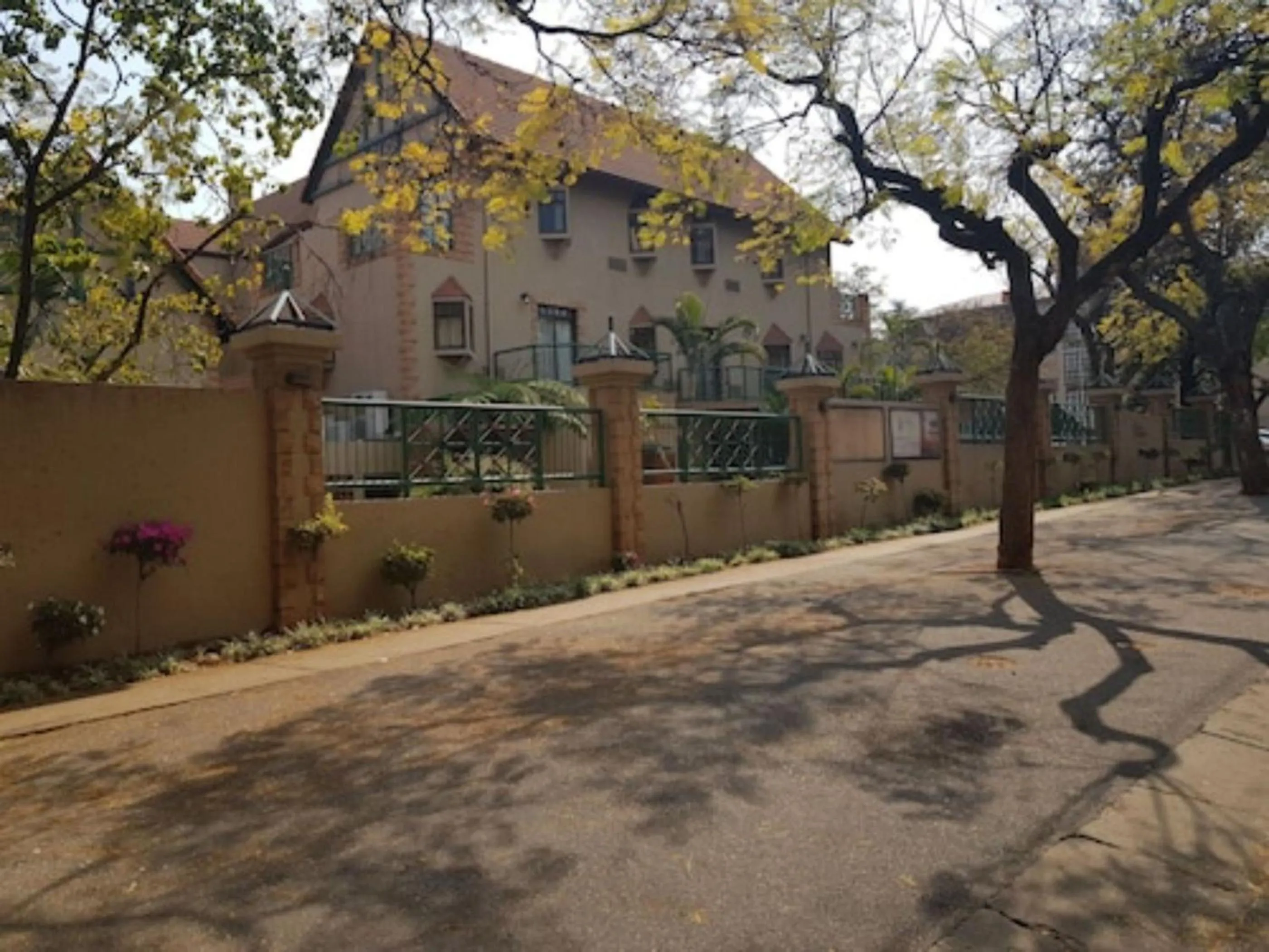 Property building in Court Classique Suite Hotel