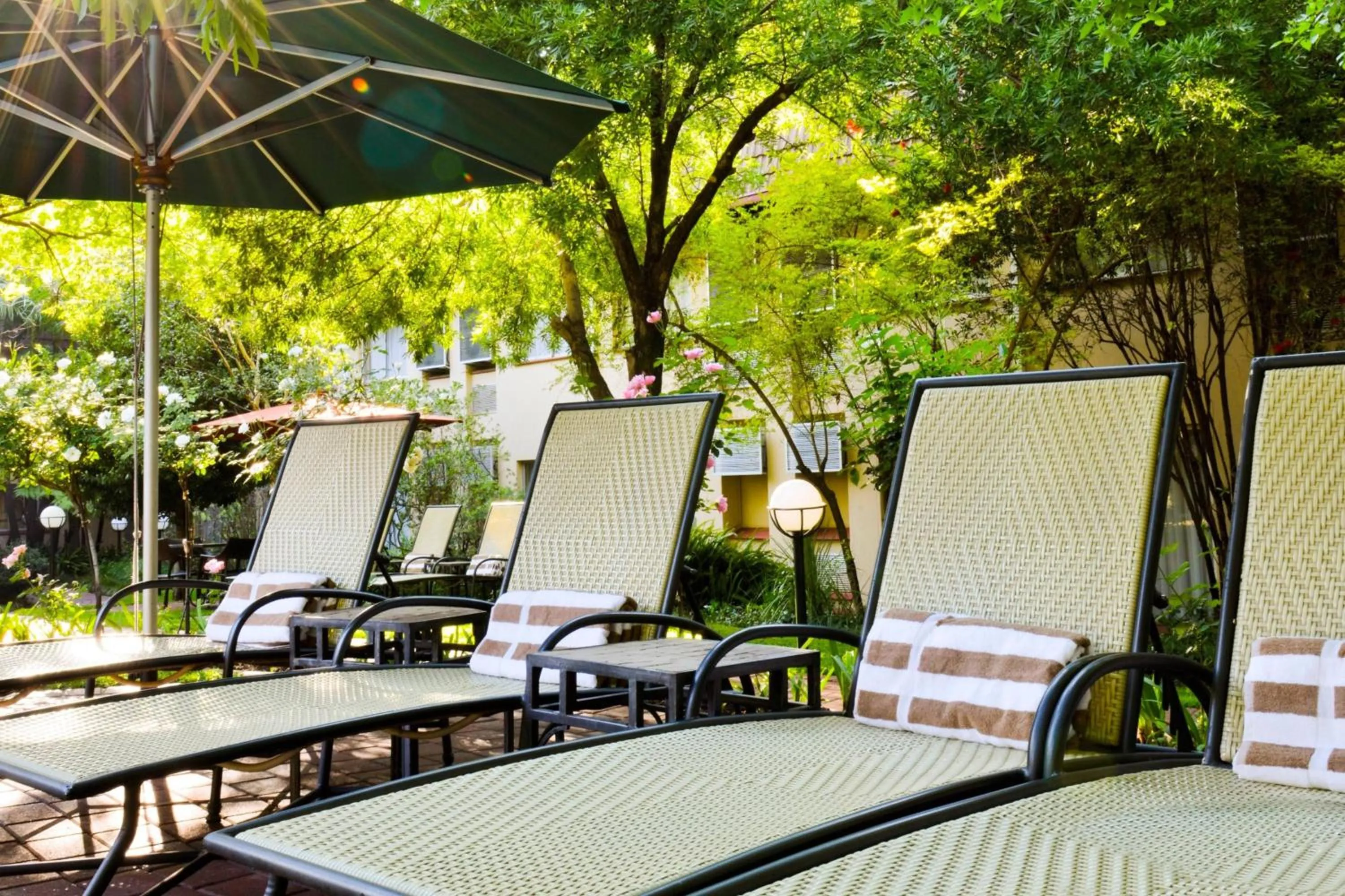 Swimming pool in Protea Hotel by Marriott Johannesburg Balalaika Sandton