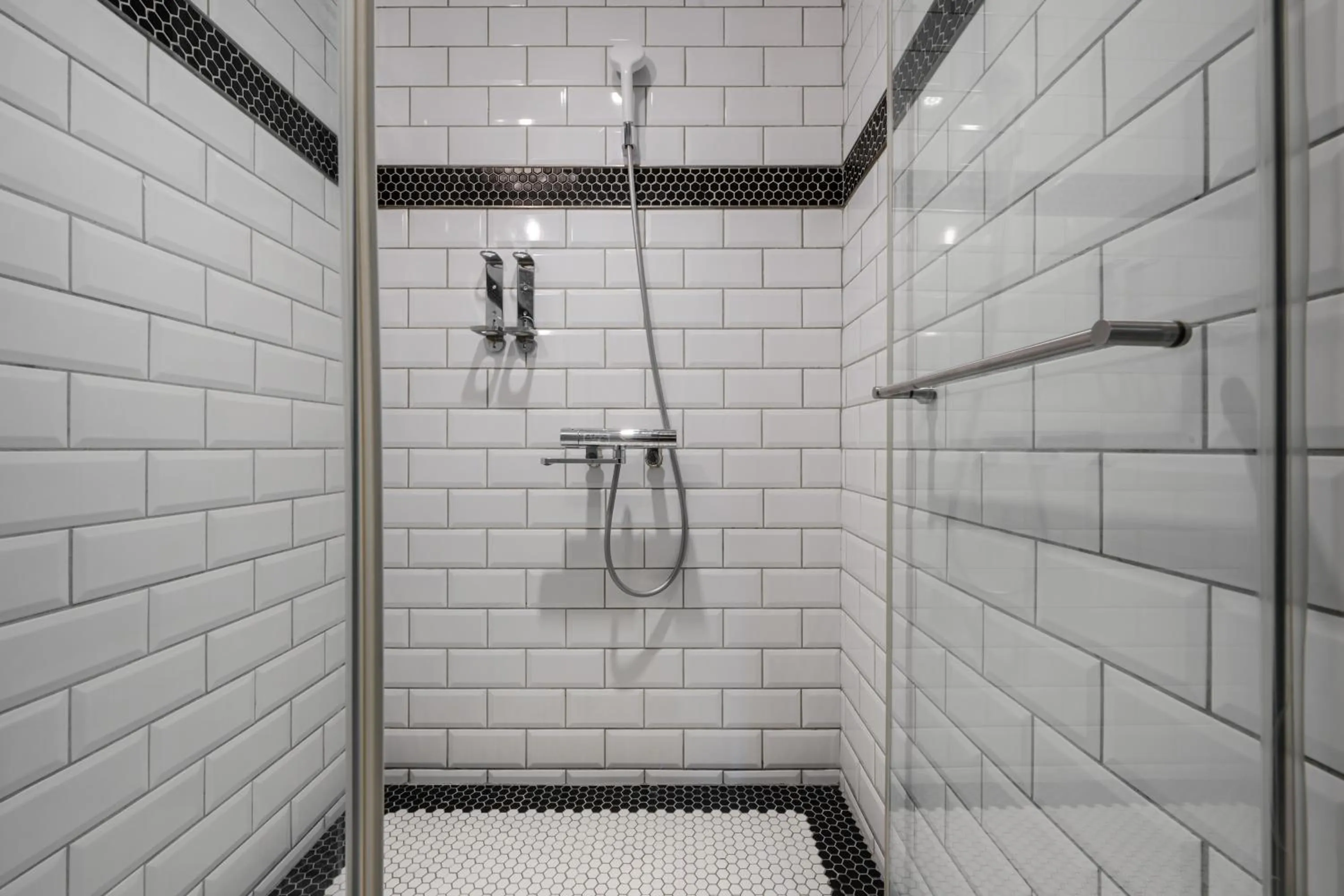 Shower in CHASE Hotel