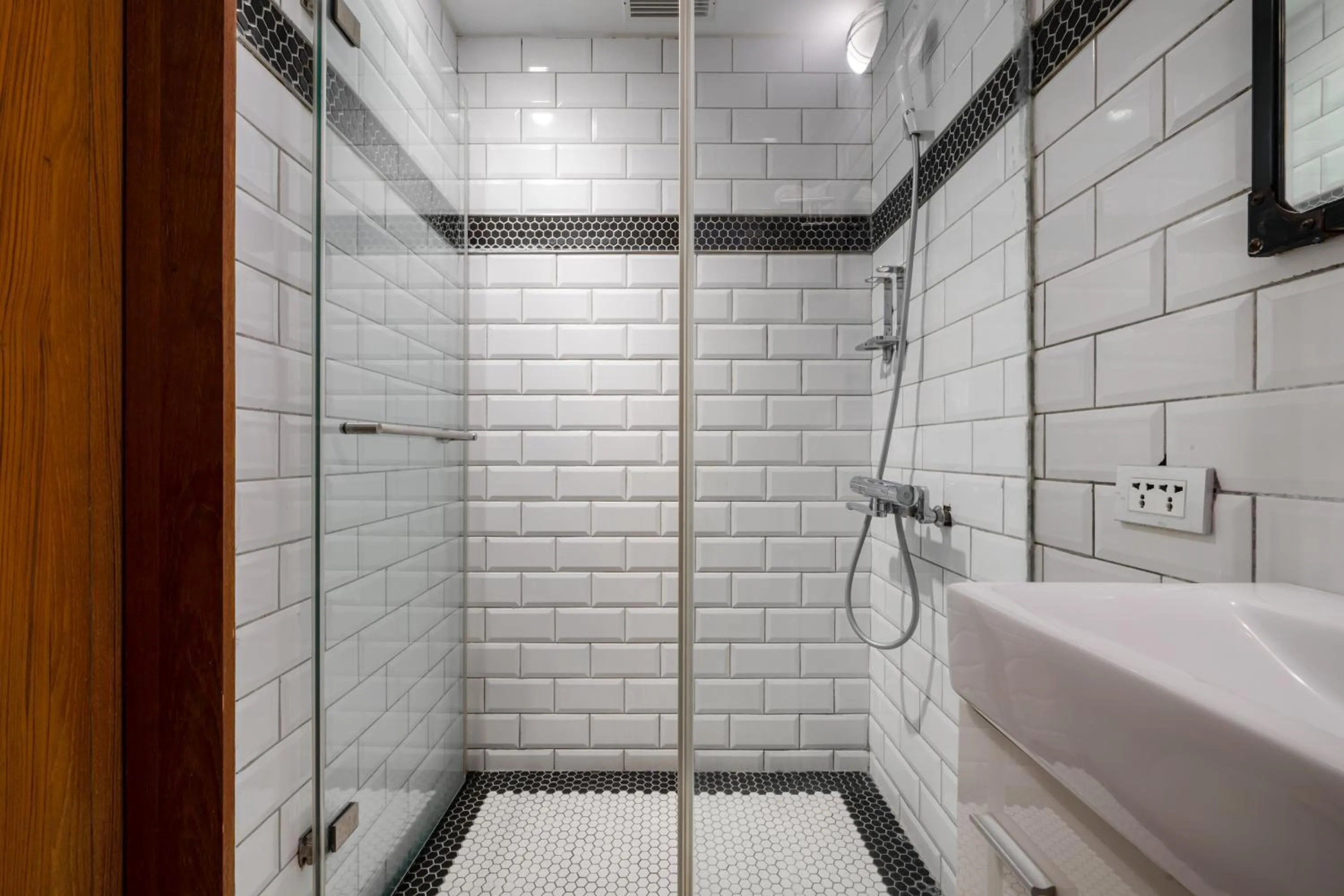 Shower in CHASE Hotel