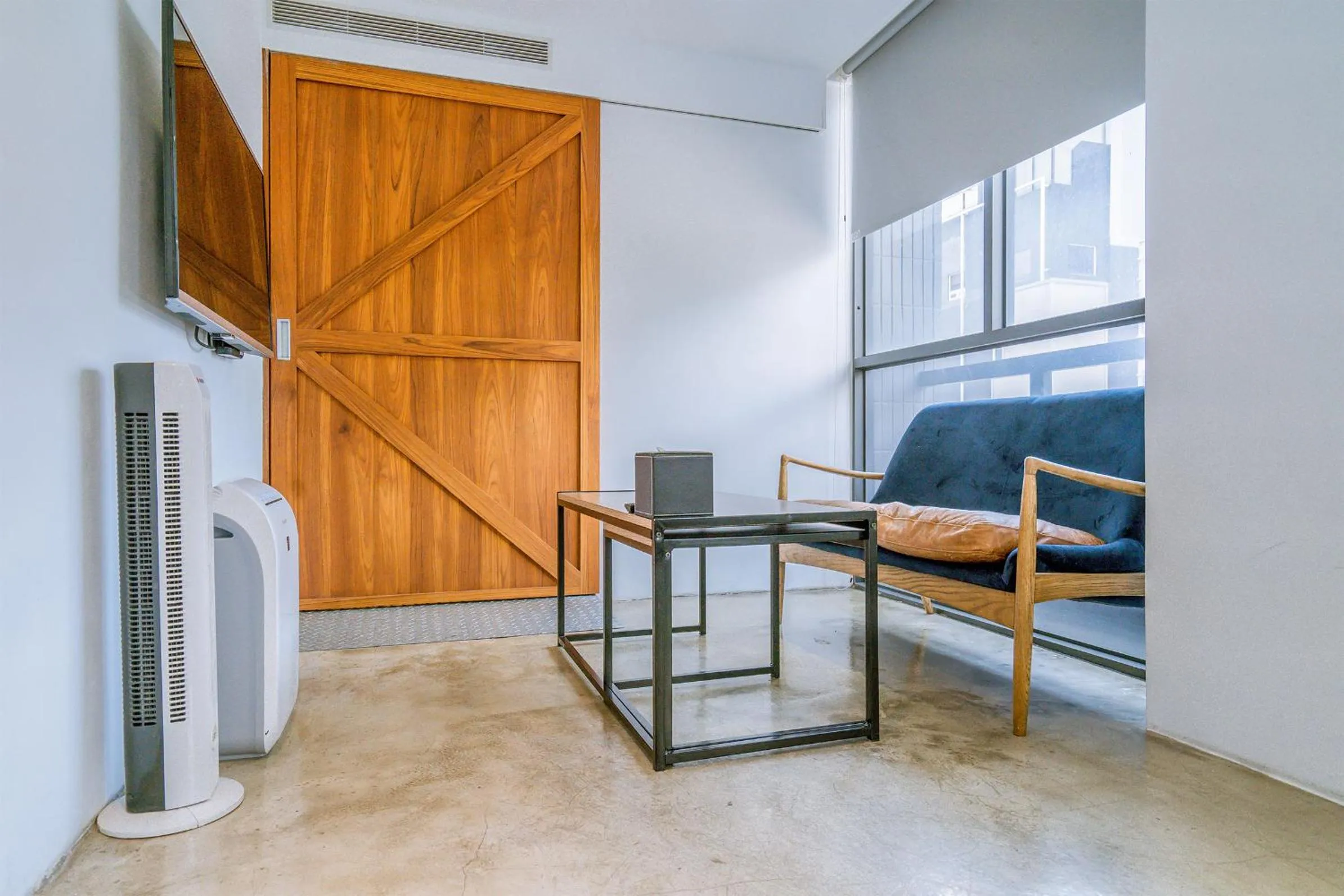 Living room in CHASE Hotel