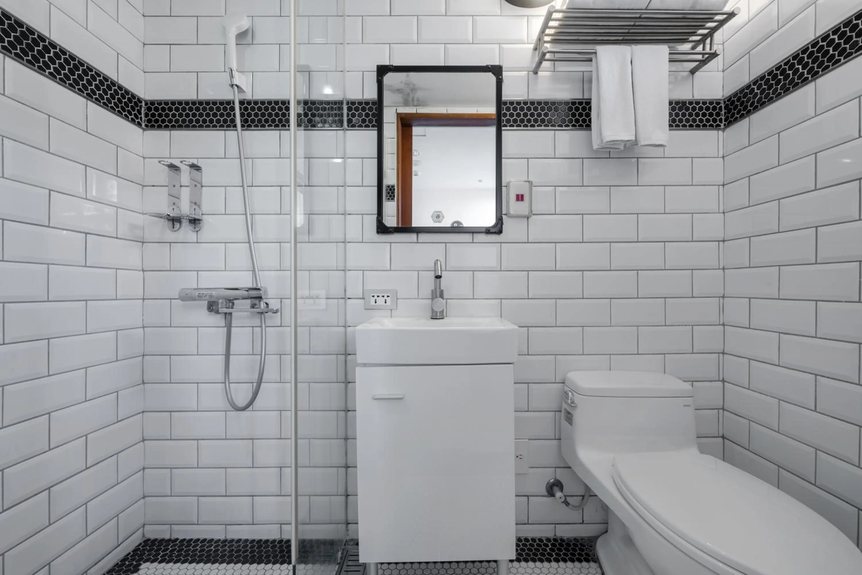 Shower in CHASE Hotel