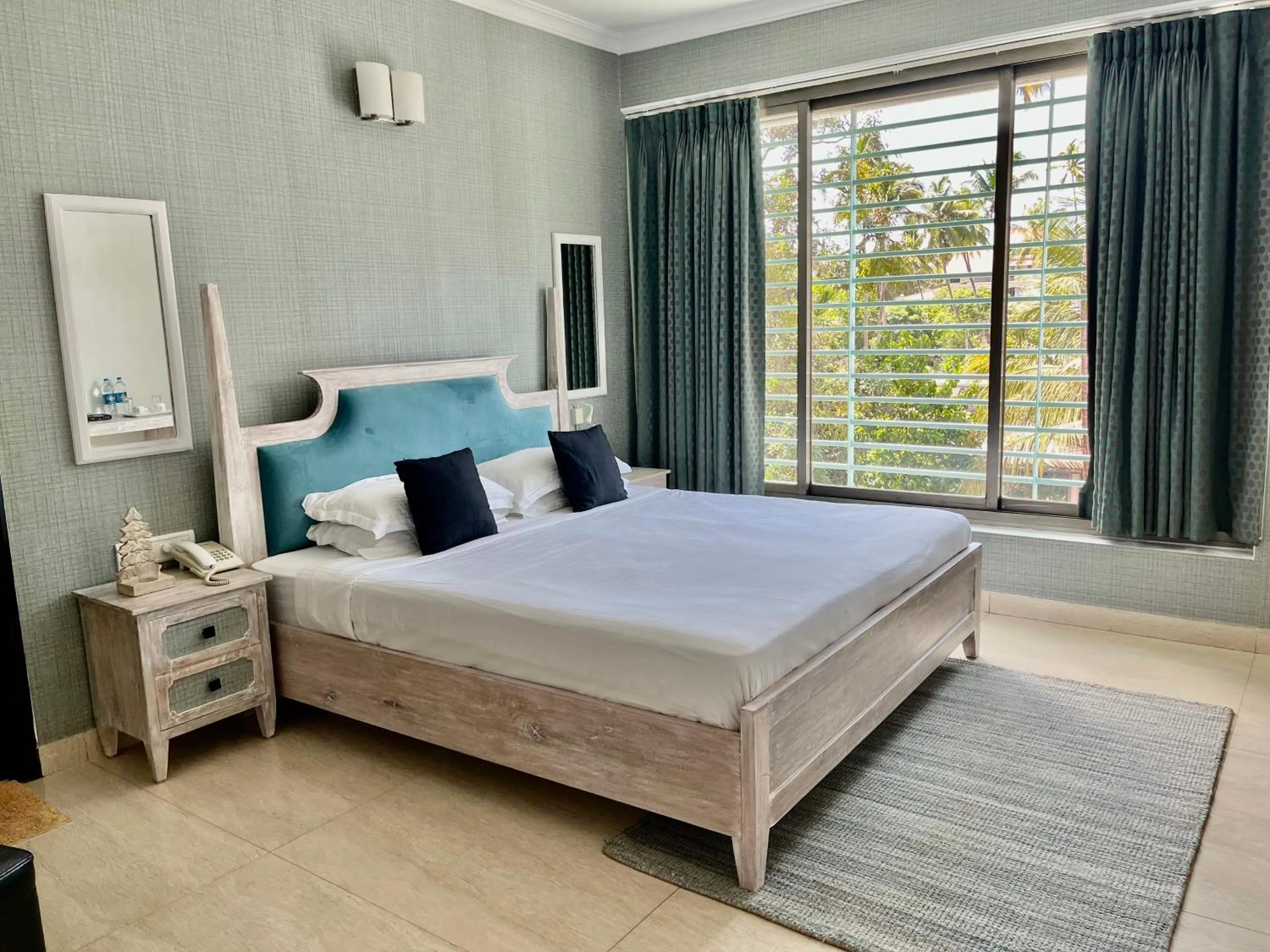 Bed in Arotel Rooms & Suites Calangute