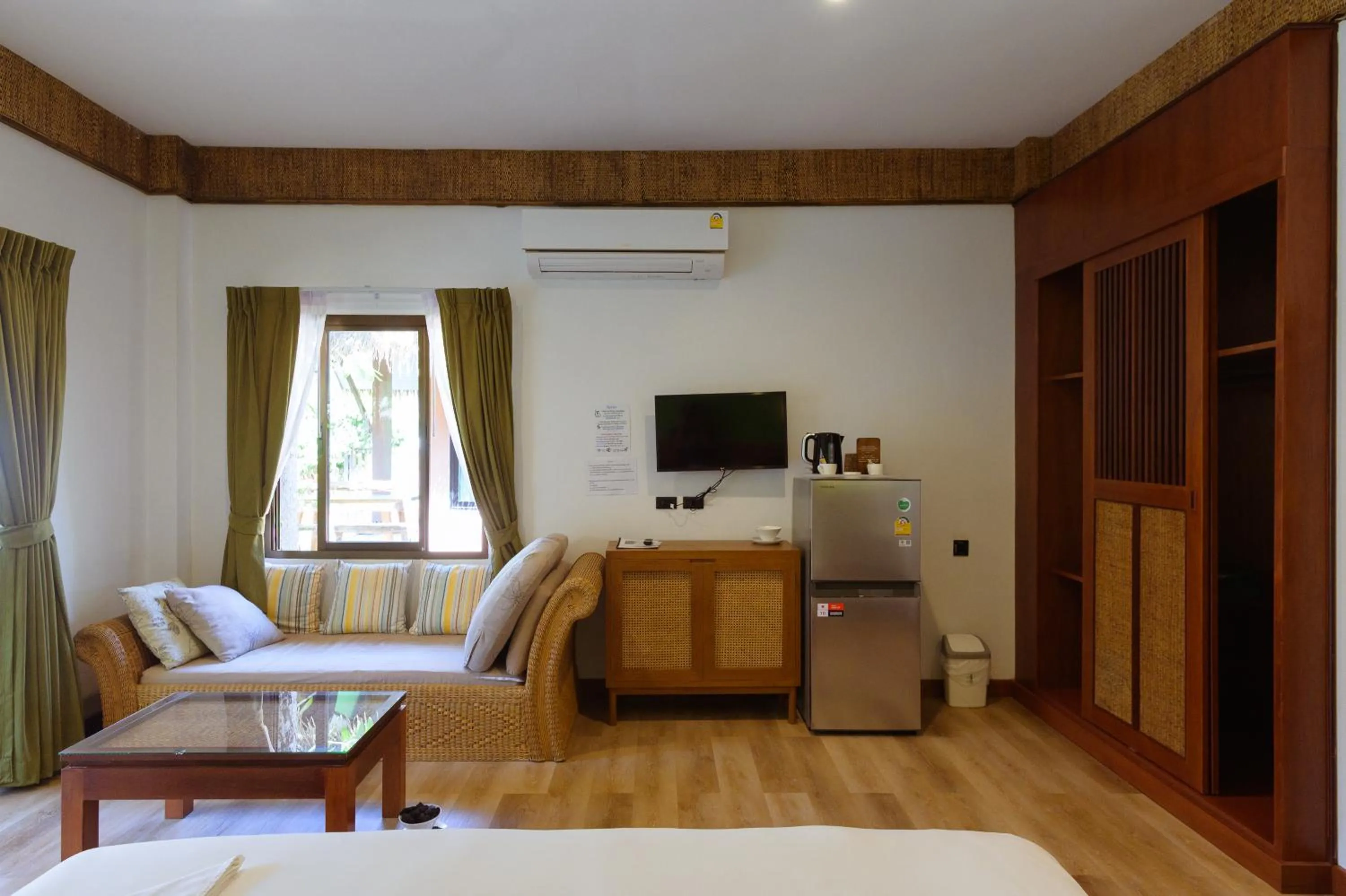 Seating area, Bed in K.B. Resort