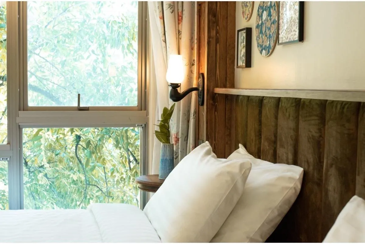 Photo of the whole room, Bed in Tints of Blue Hotel