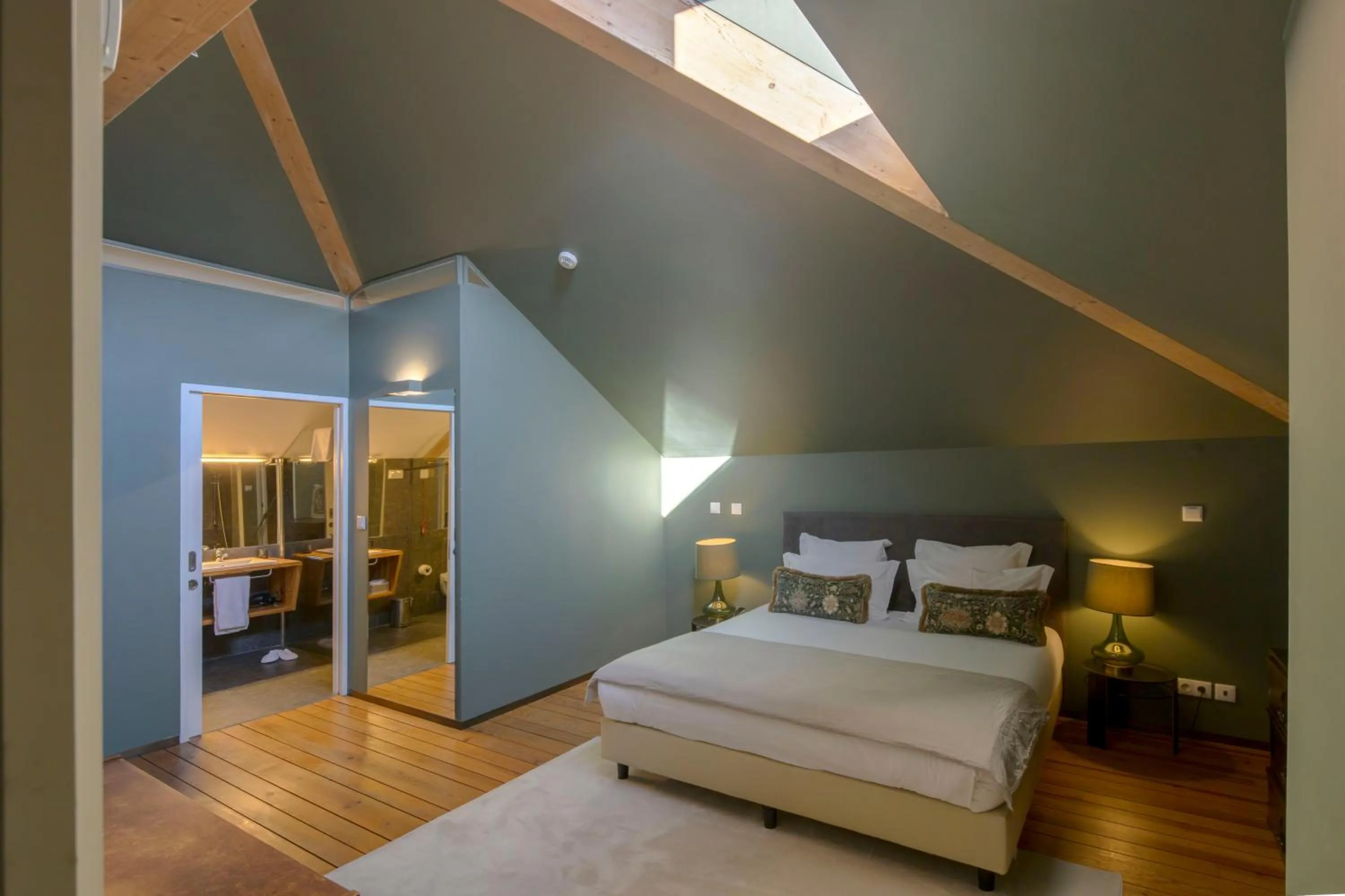 Bed in Condes de Azevedo Palace Apartments