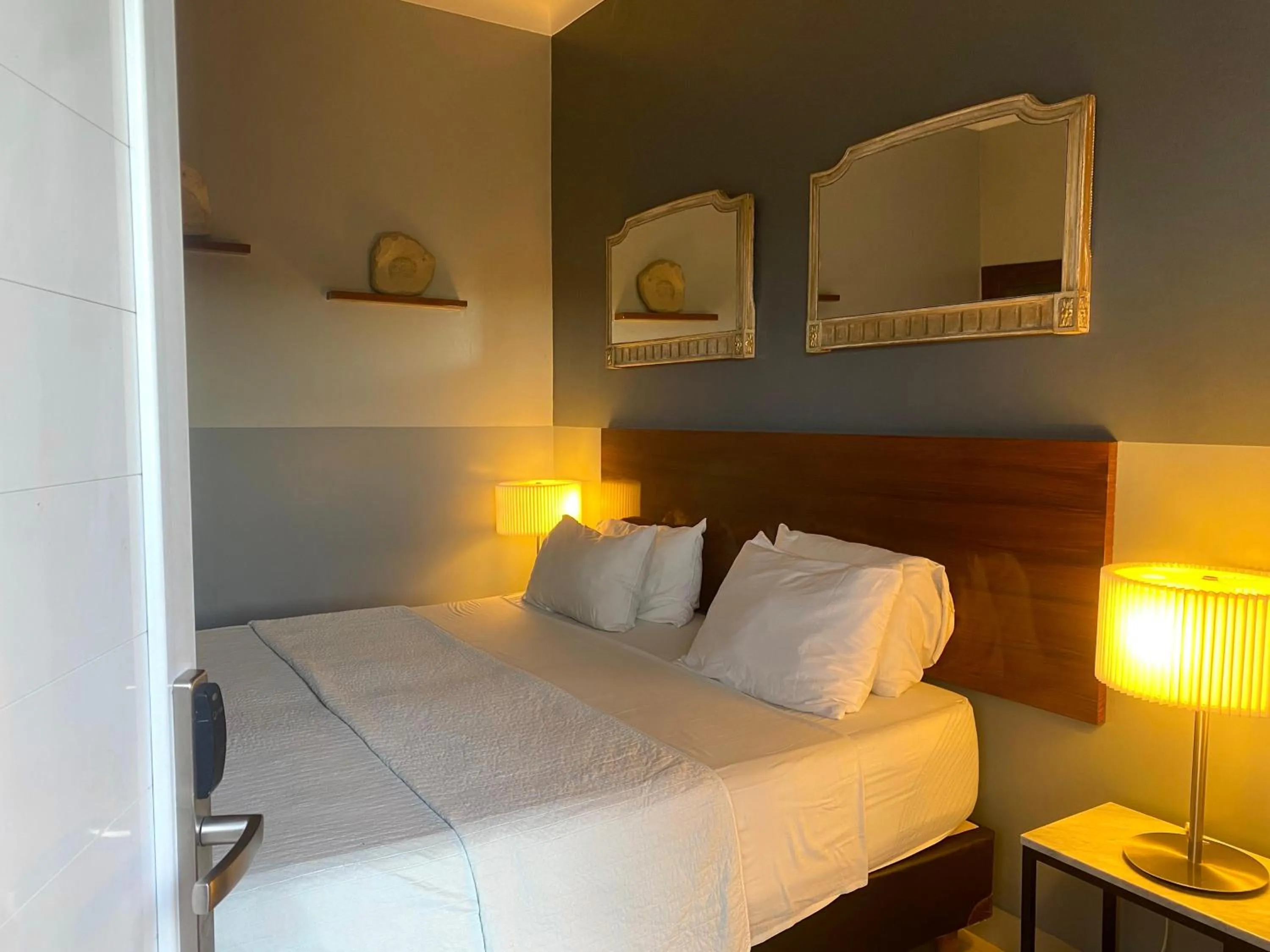 Bed in EZE Inn Boutique Hotel