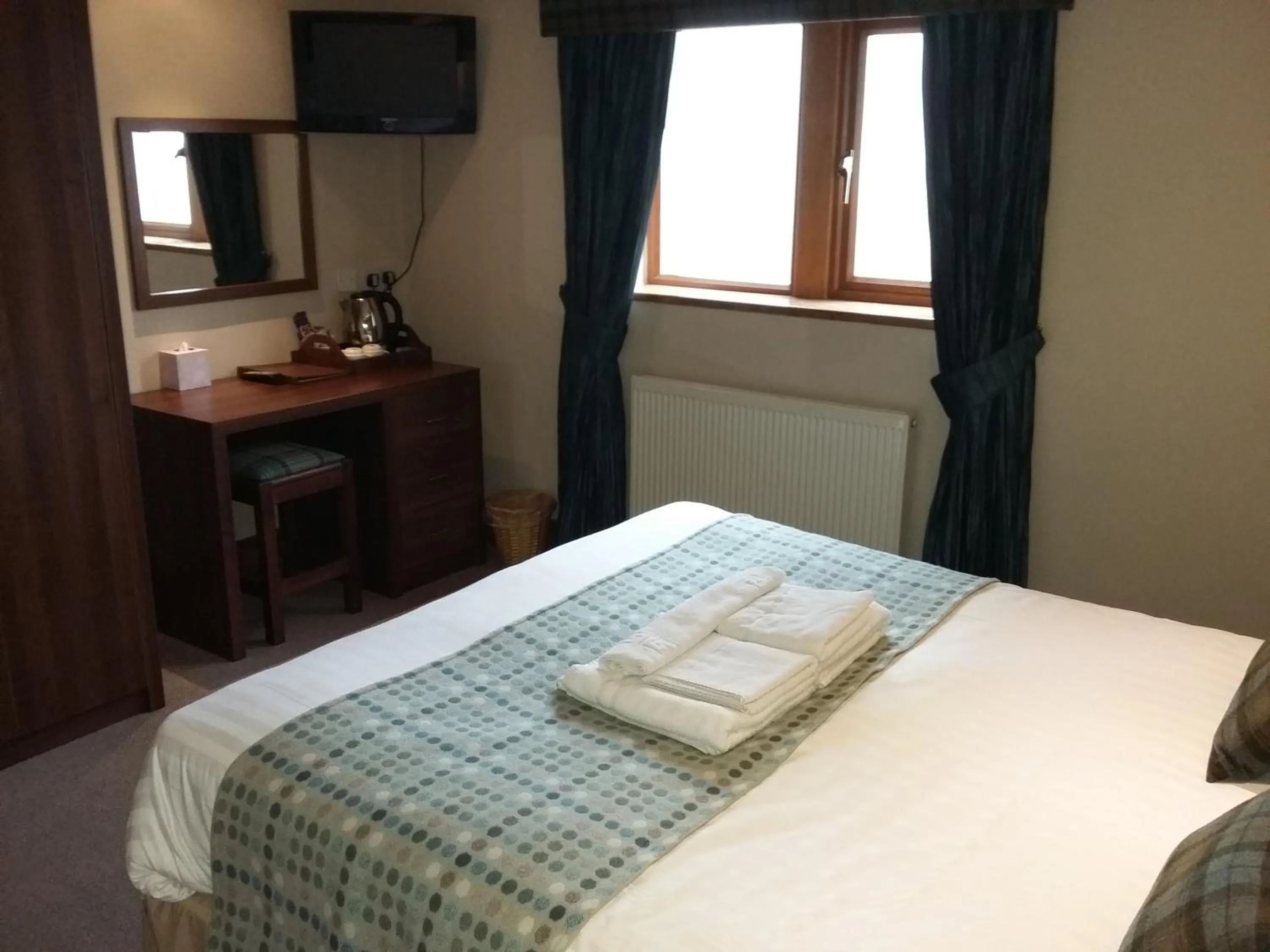 Bed in The Huntsman Inn