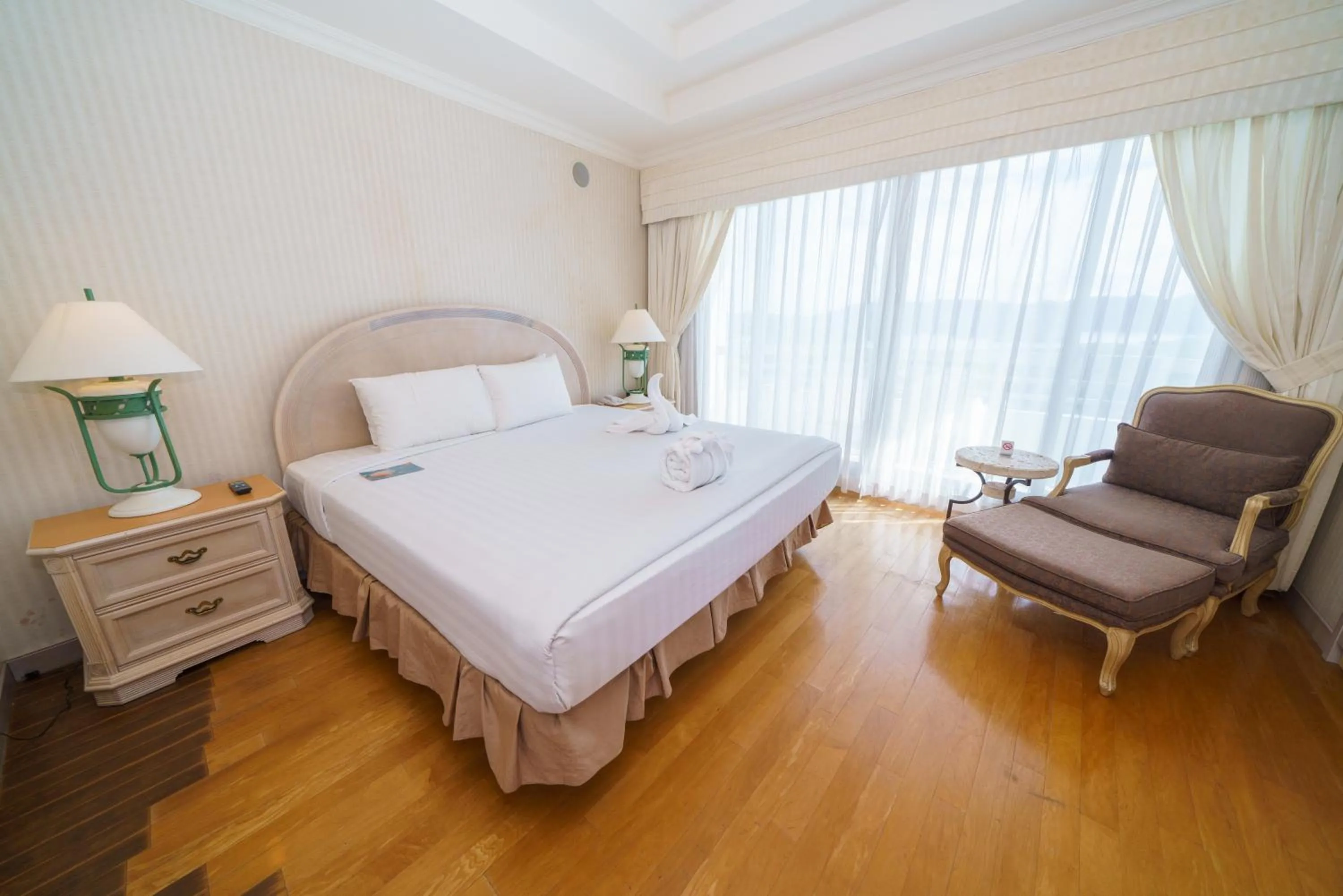 Bed in Palasia Hotel