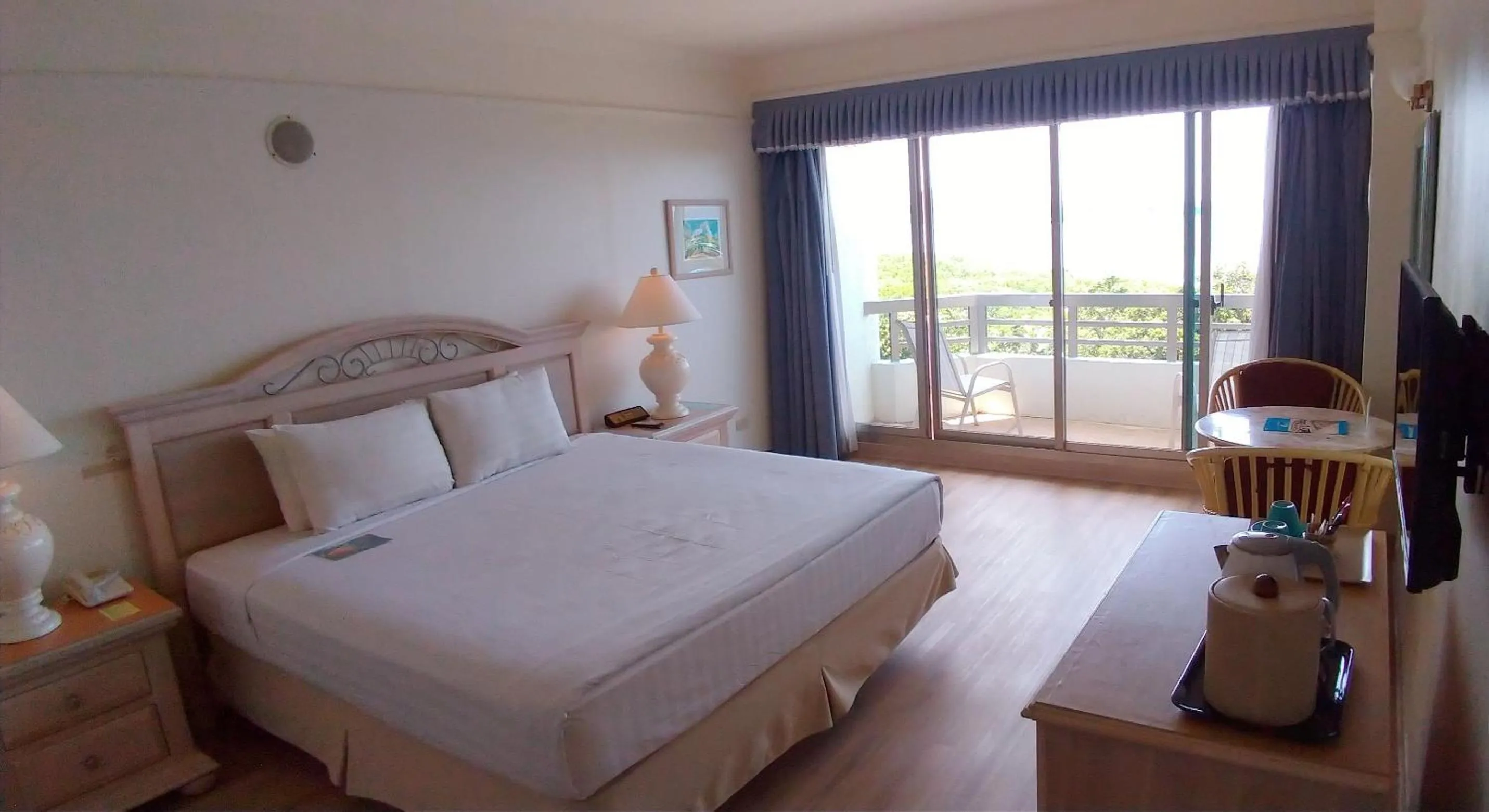 Bed in Palasia Hotel