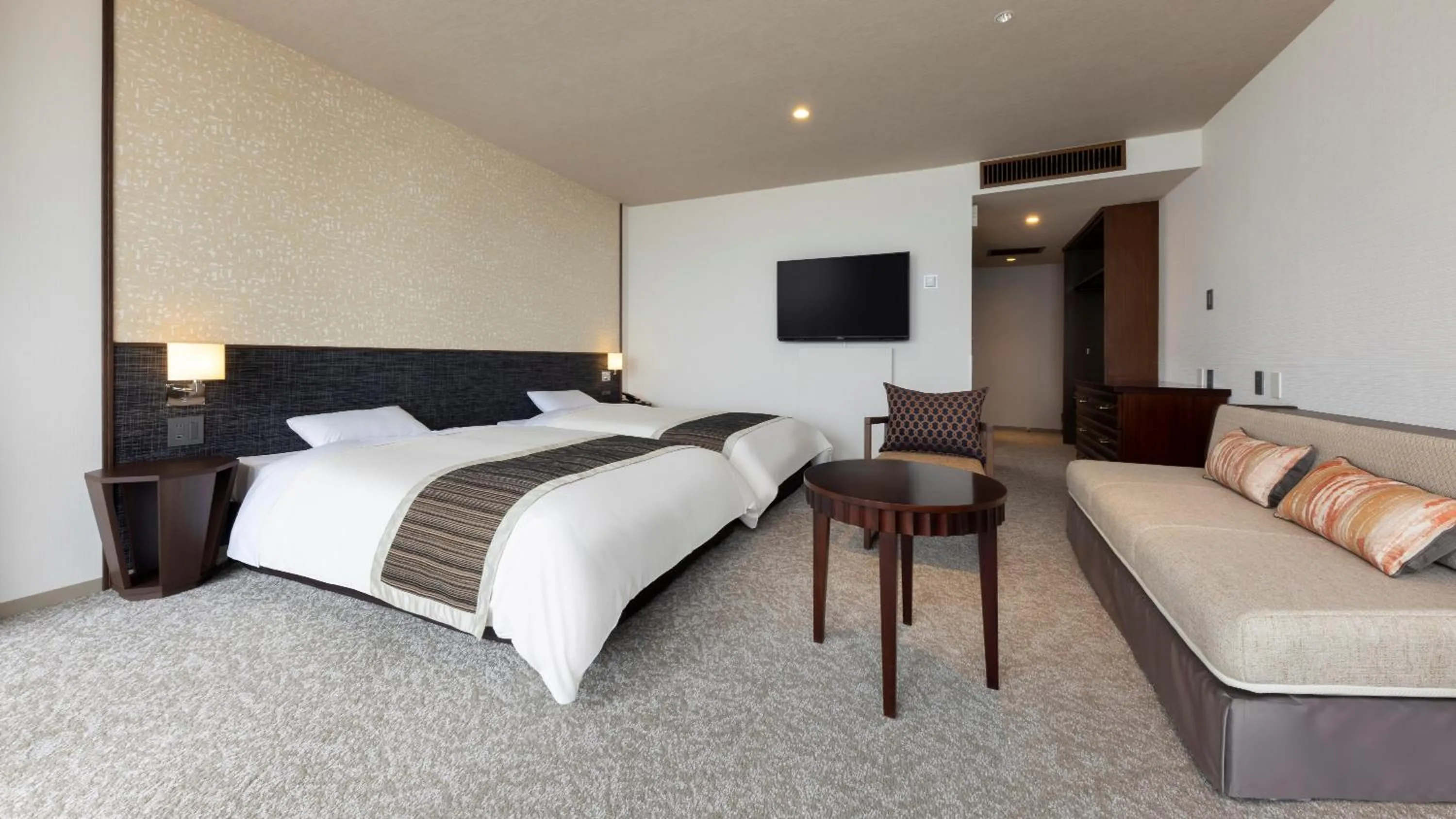 Bed in Kamogawa Grand Hotel