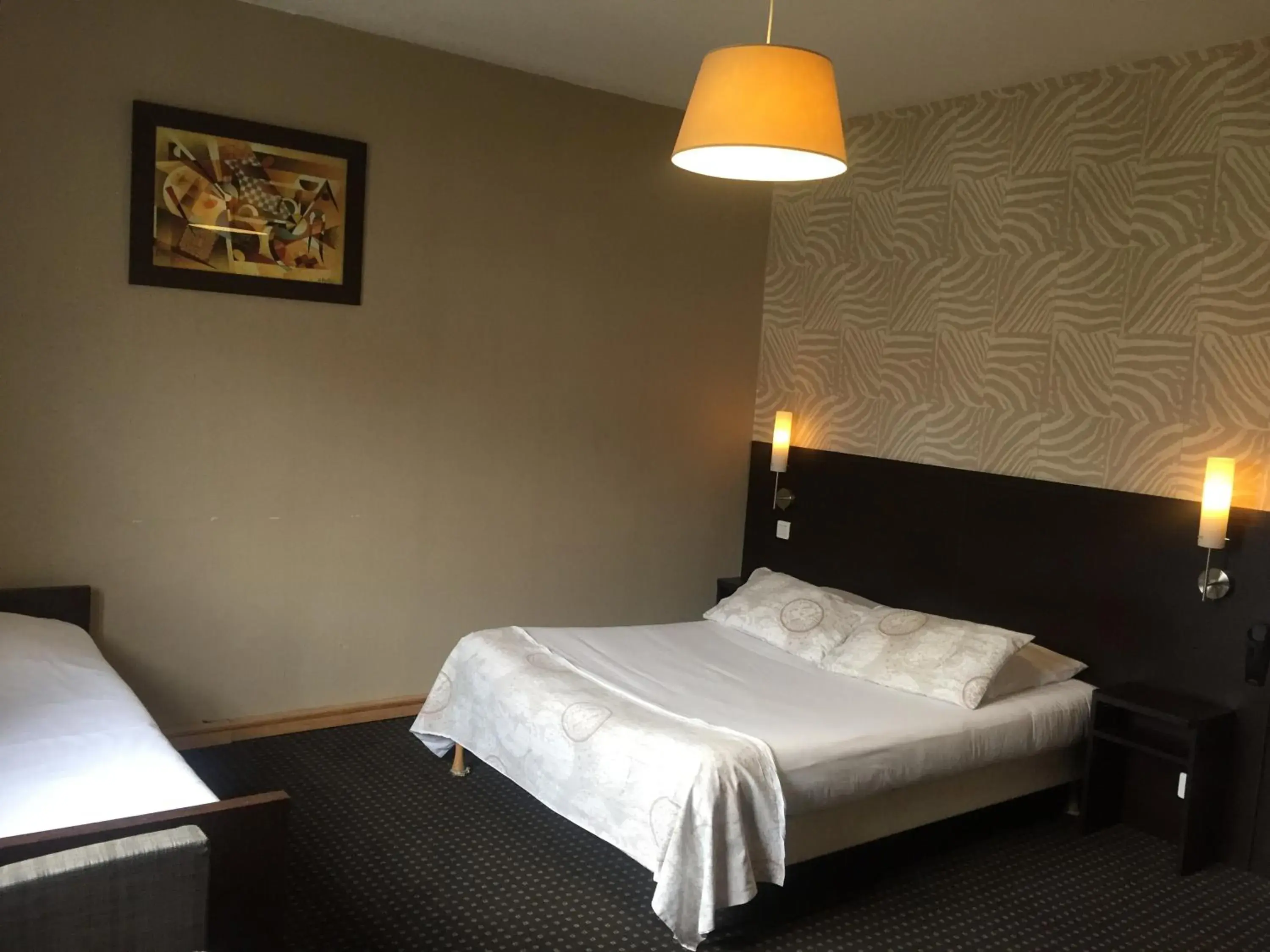 Quadruple Room in Hotel Restaurant Cousseau Quadruple Room in Hotel Restaurant Cousseau