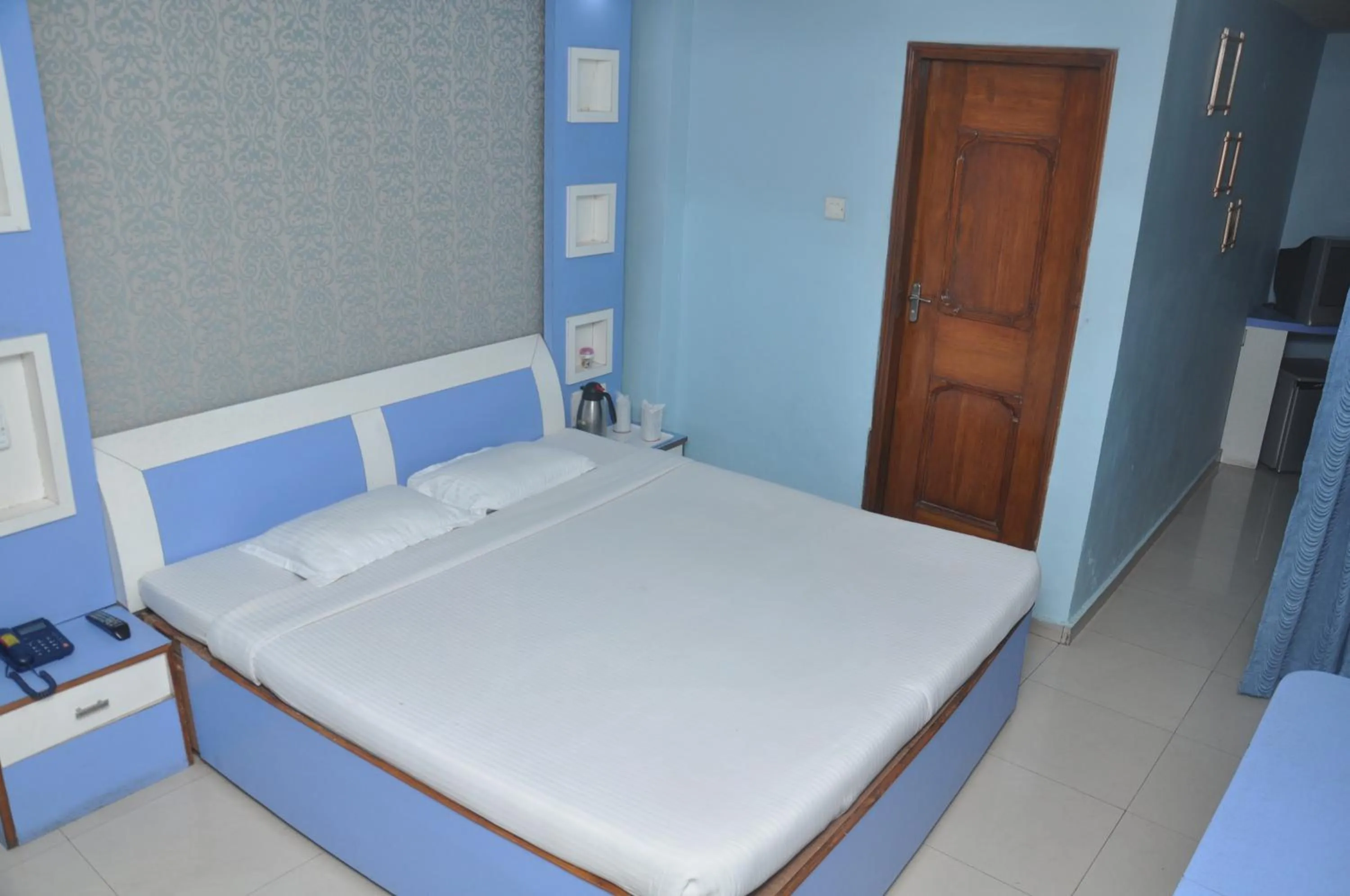 Bed in Hotel Grand Arjun