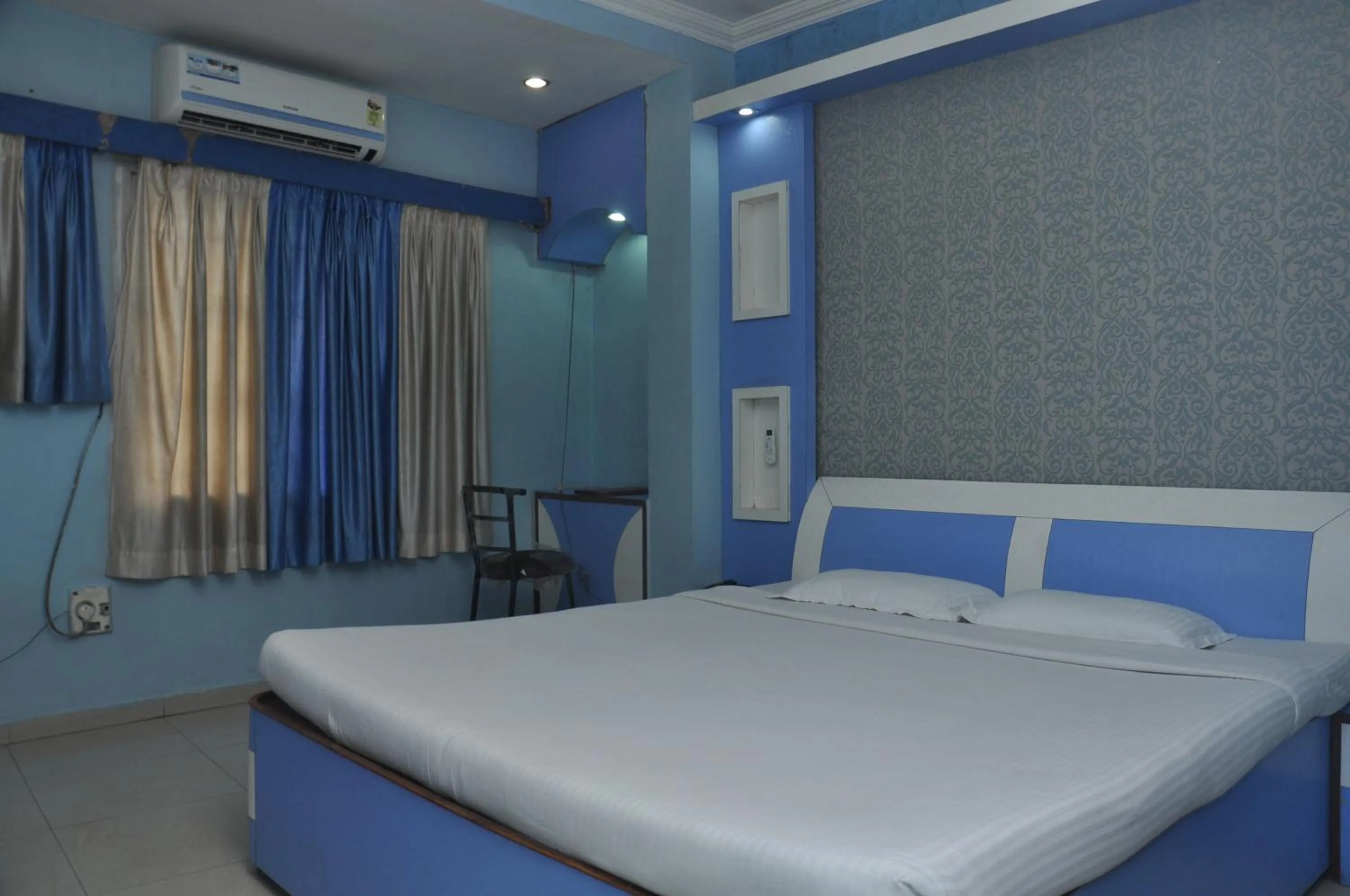 Bed in Hotel Grand Arjun