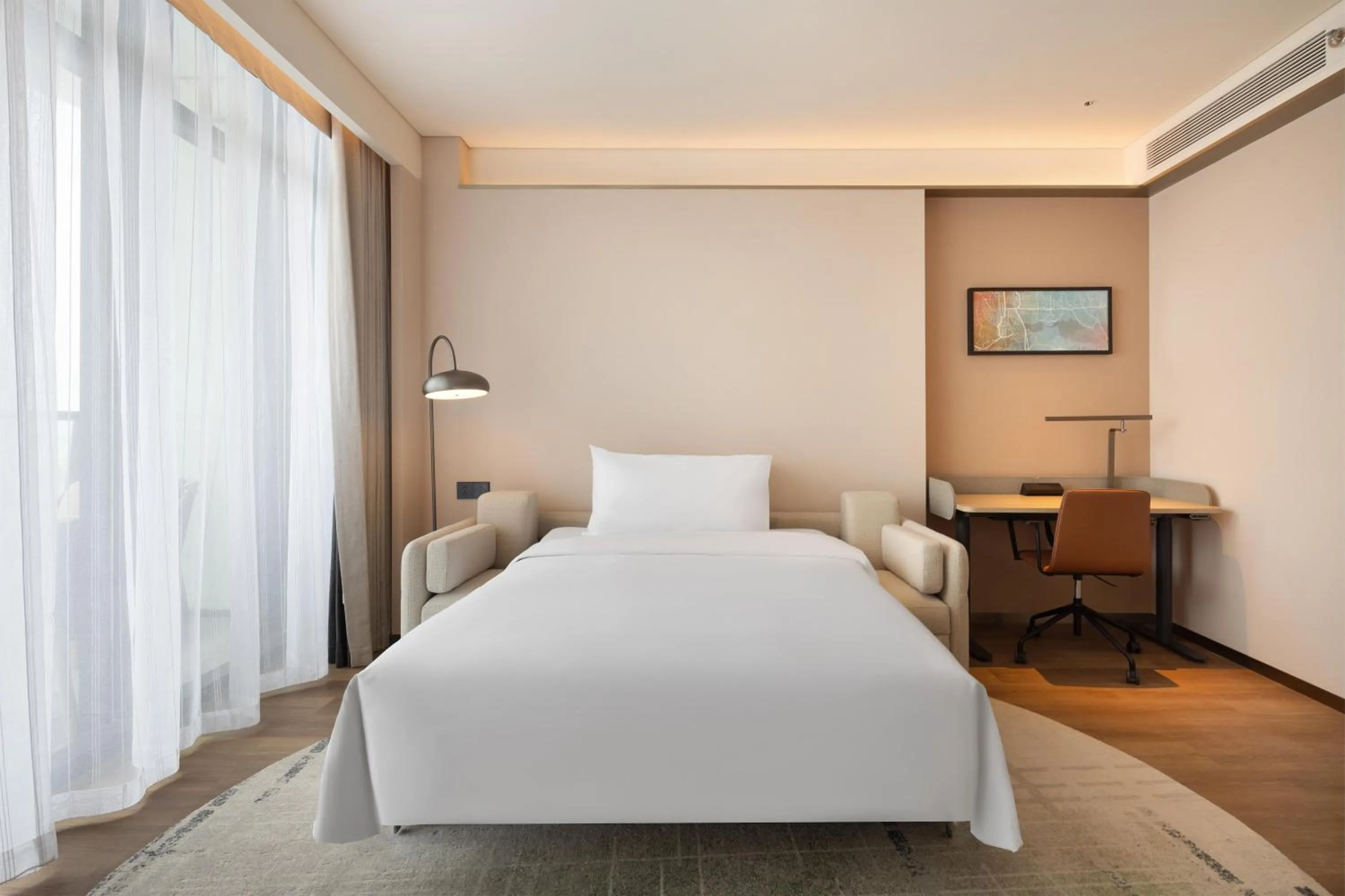 Living room, Bed in Hilton Garden Inn Huangshi Dinosaur Wonderland