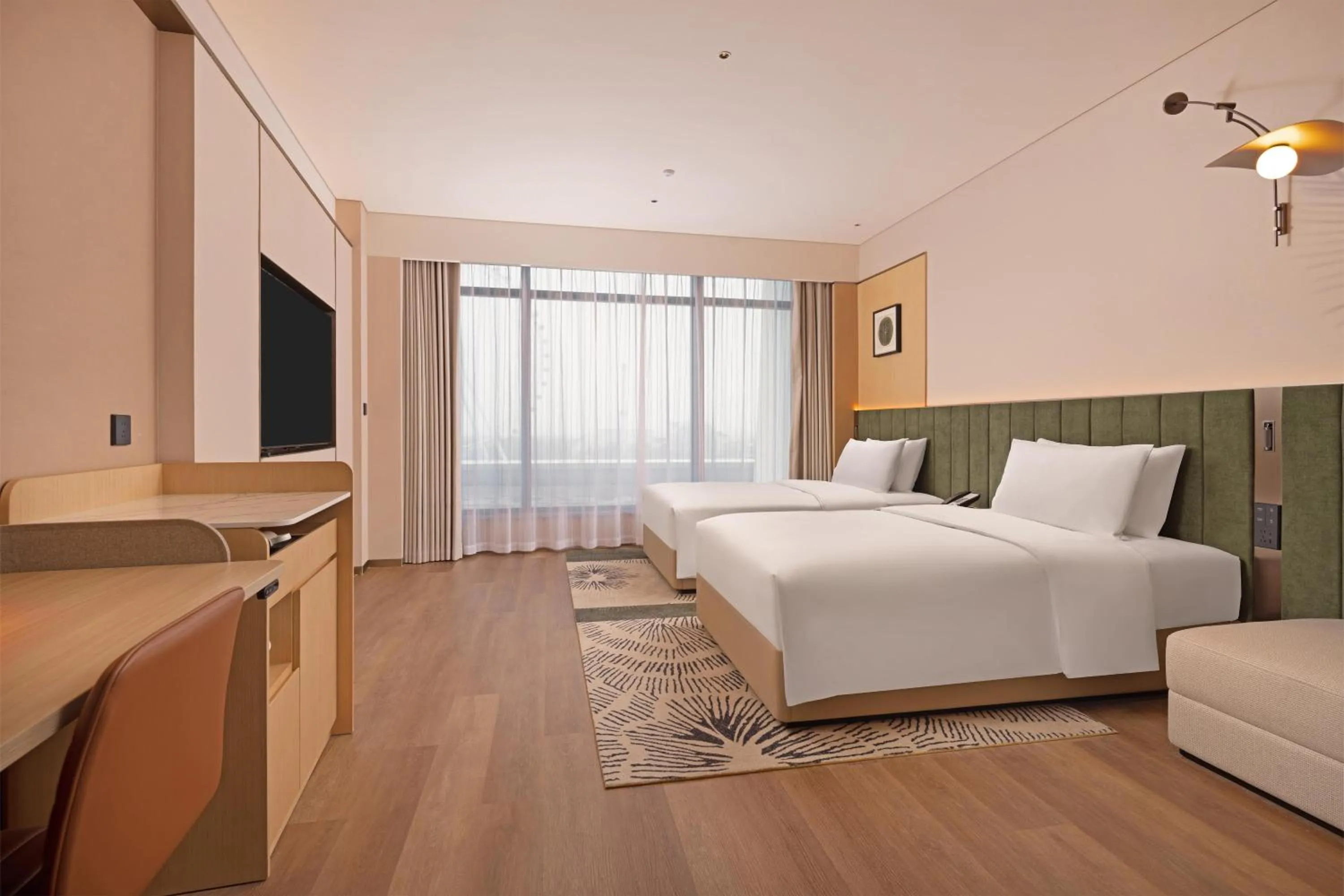 Bed in Hilton Garden Inn Huangshi Dinosaur Wonderland