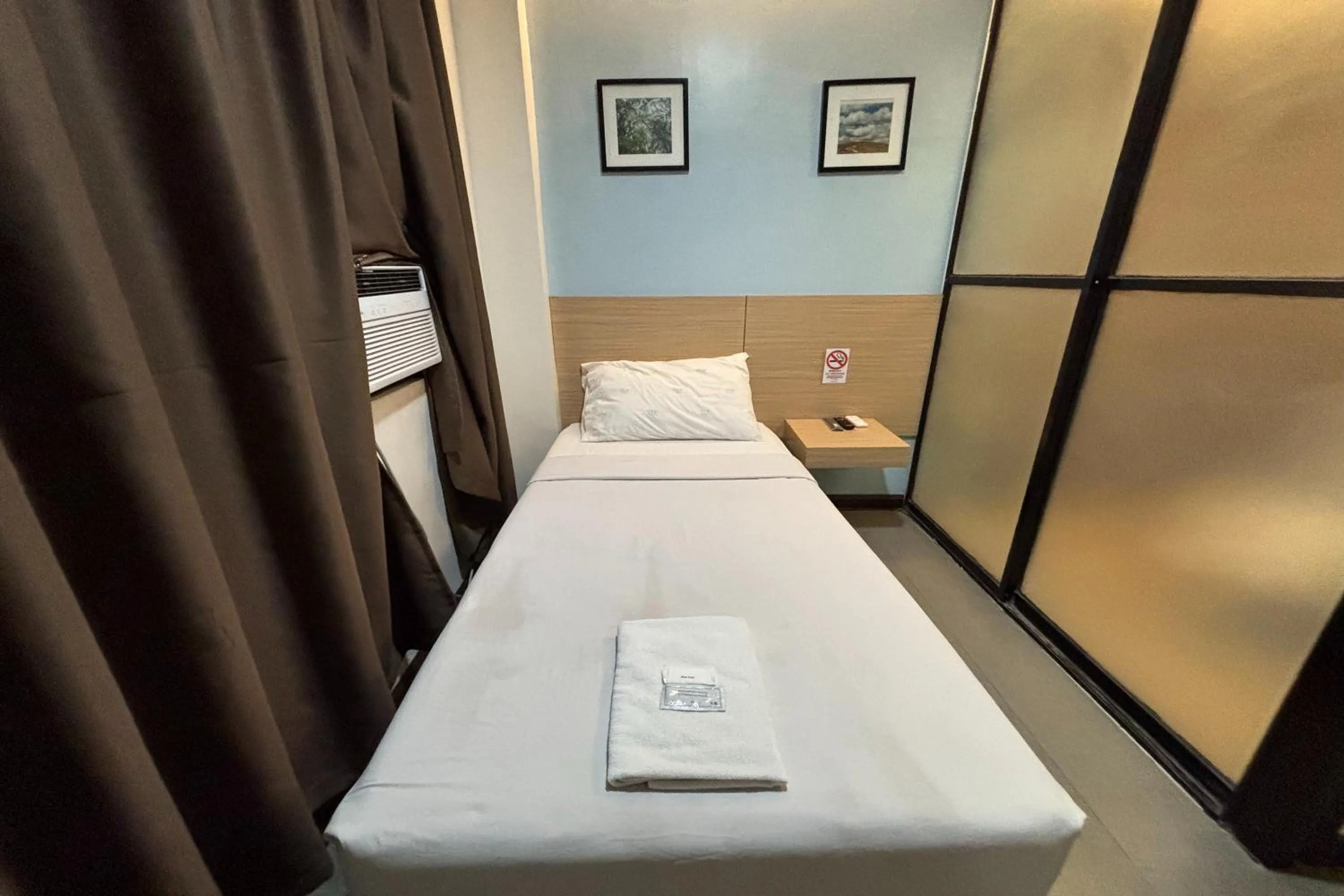 Bed in Alchan Suites