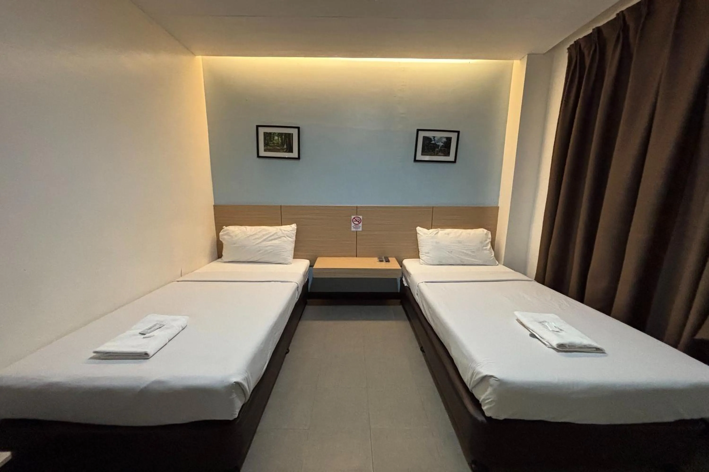 Bed in Alchan Suites