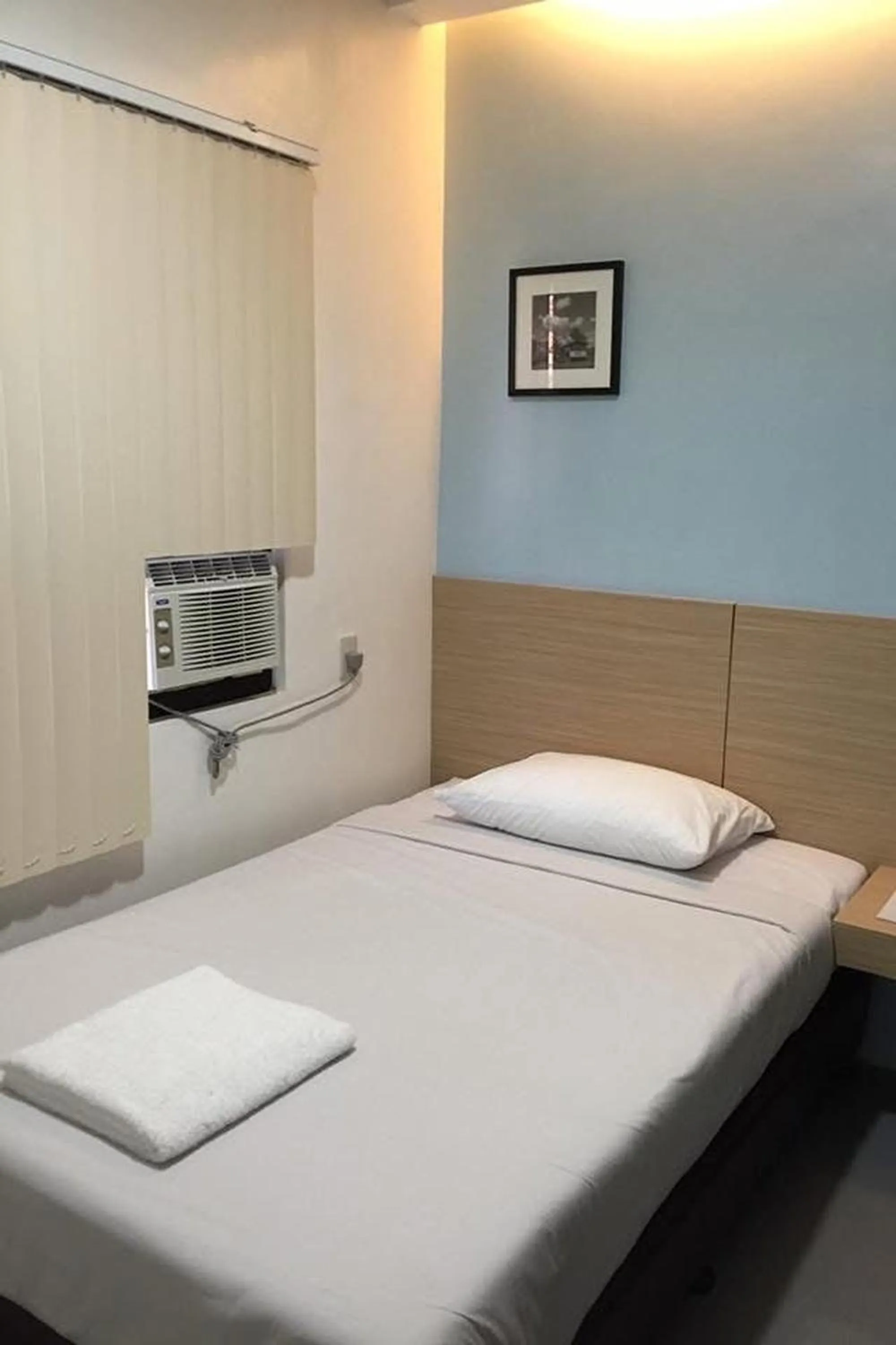 Bed in Alchan Suites