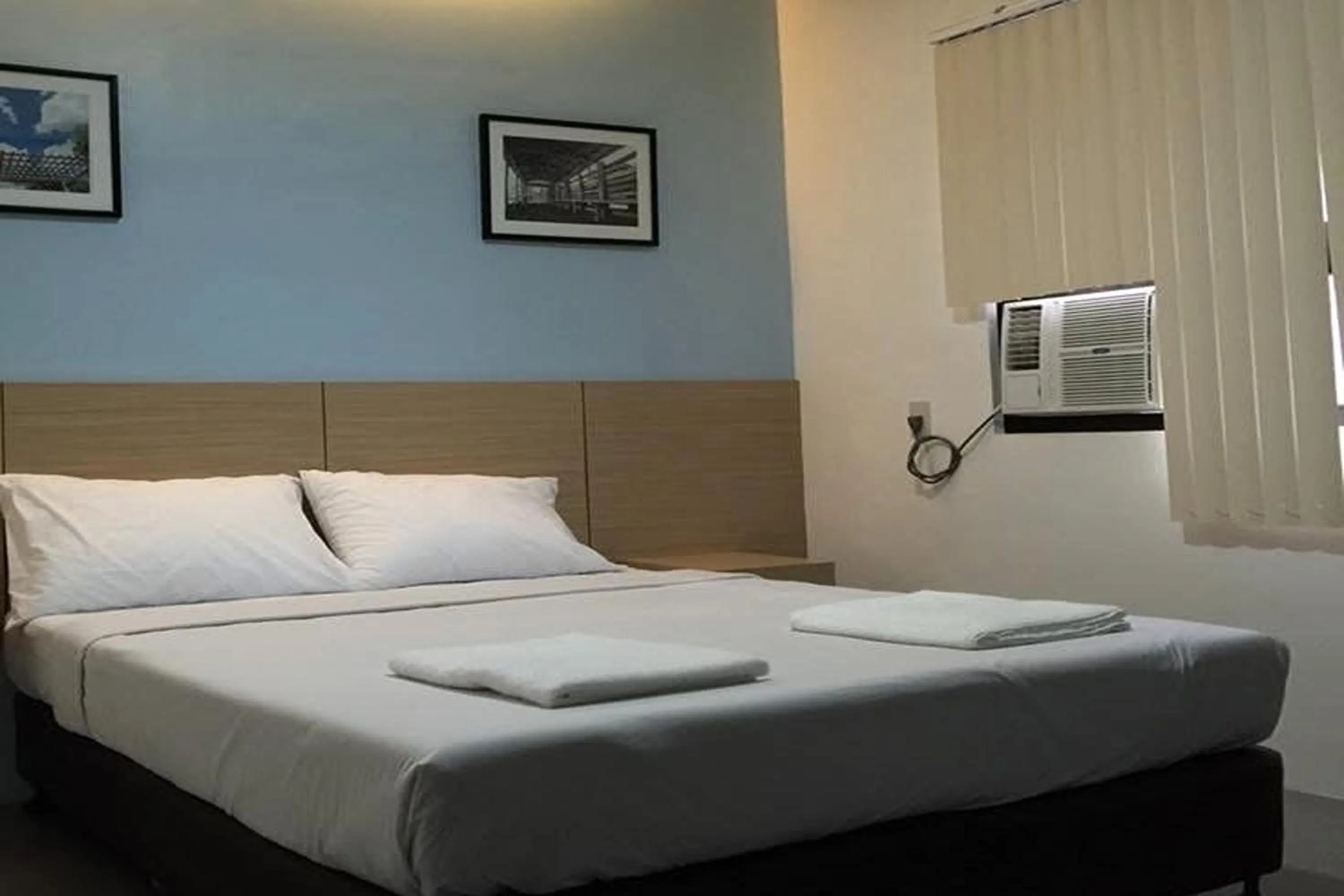 Bed in Alchan Suites