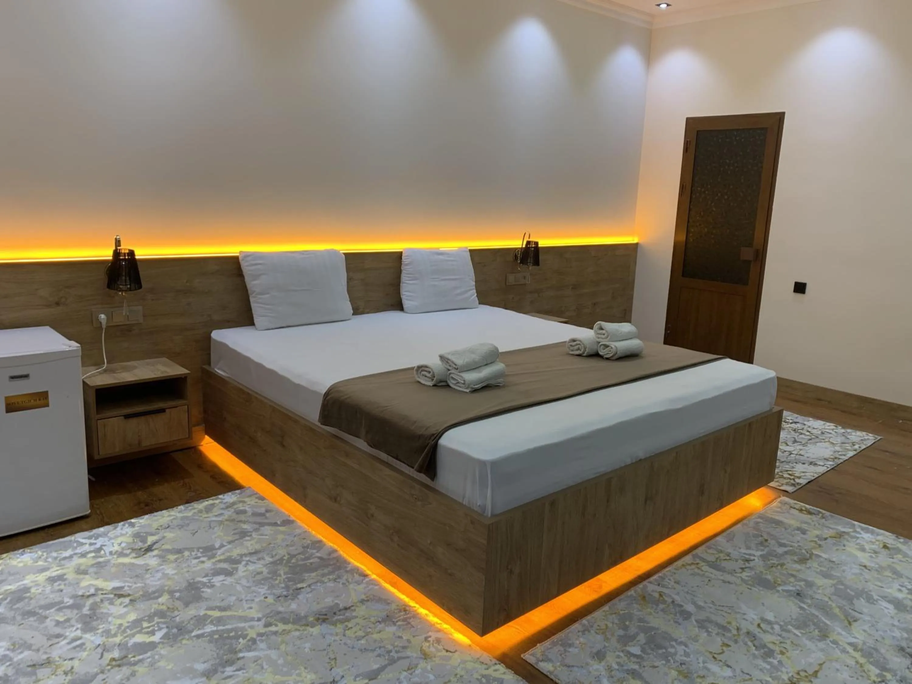 Photo of the whole room, Bed in Hotel Euro Asia Khiva in Ichan Qala