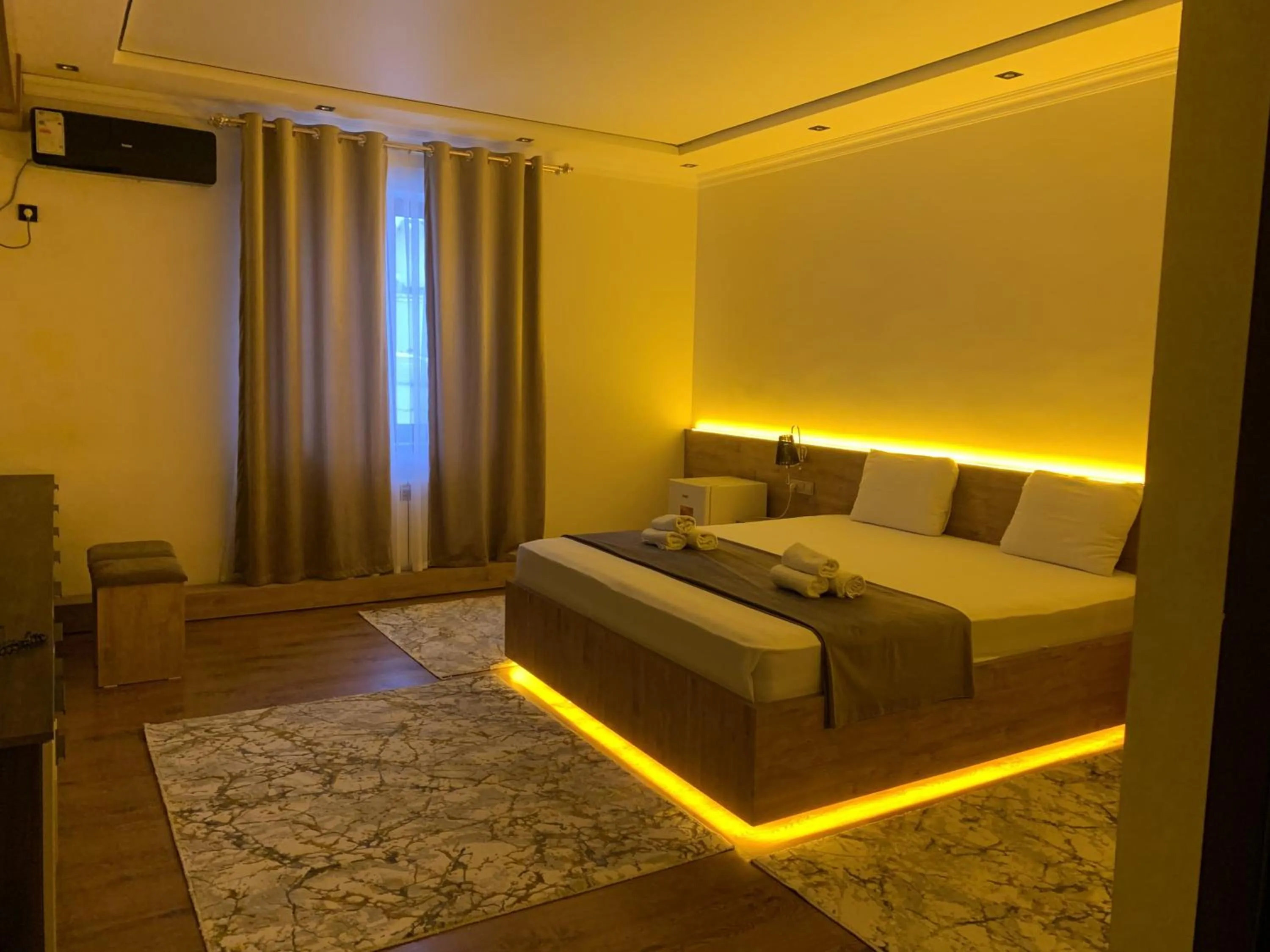 Photo of the whole room, Bed in Hotel Euro Asia Khiva in Ichan Qala