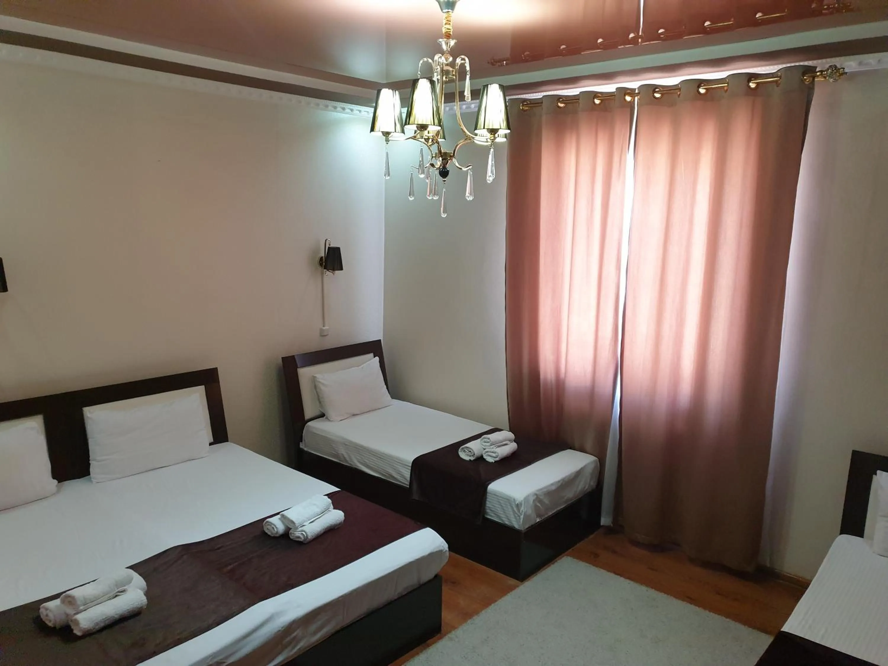 Photo of the whole room, Bed in Hotel Euro Asia Khiva in Ichan Qala