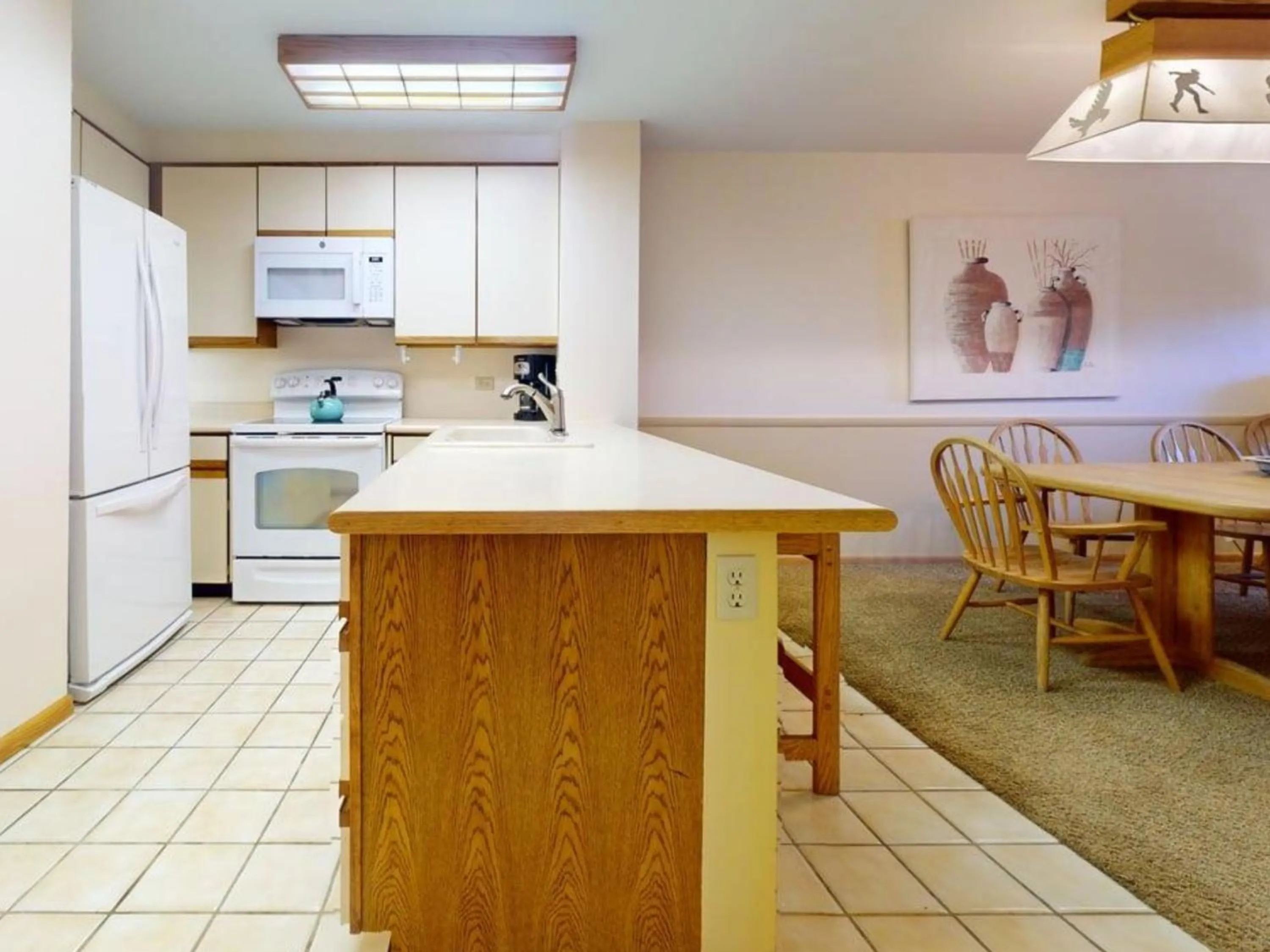 Kitchen or kitchenette in Enzian - CoralTree Residence Collection