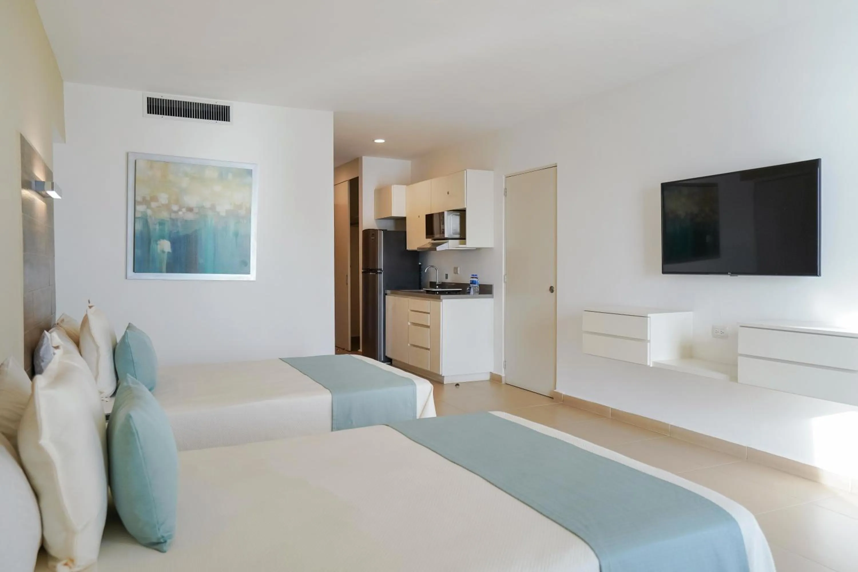 Photo of the whole room, Bed in Pacific Palace Beach Tower Hotel