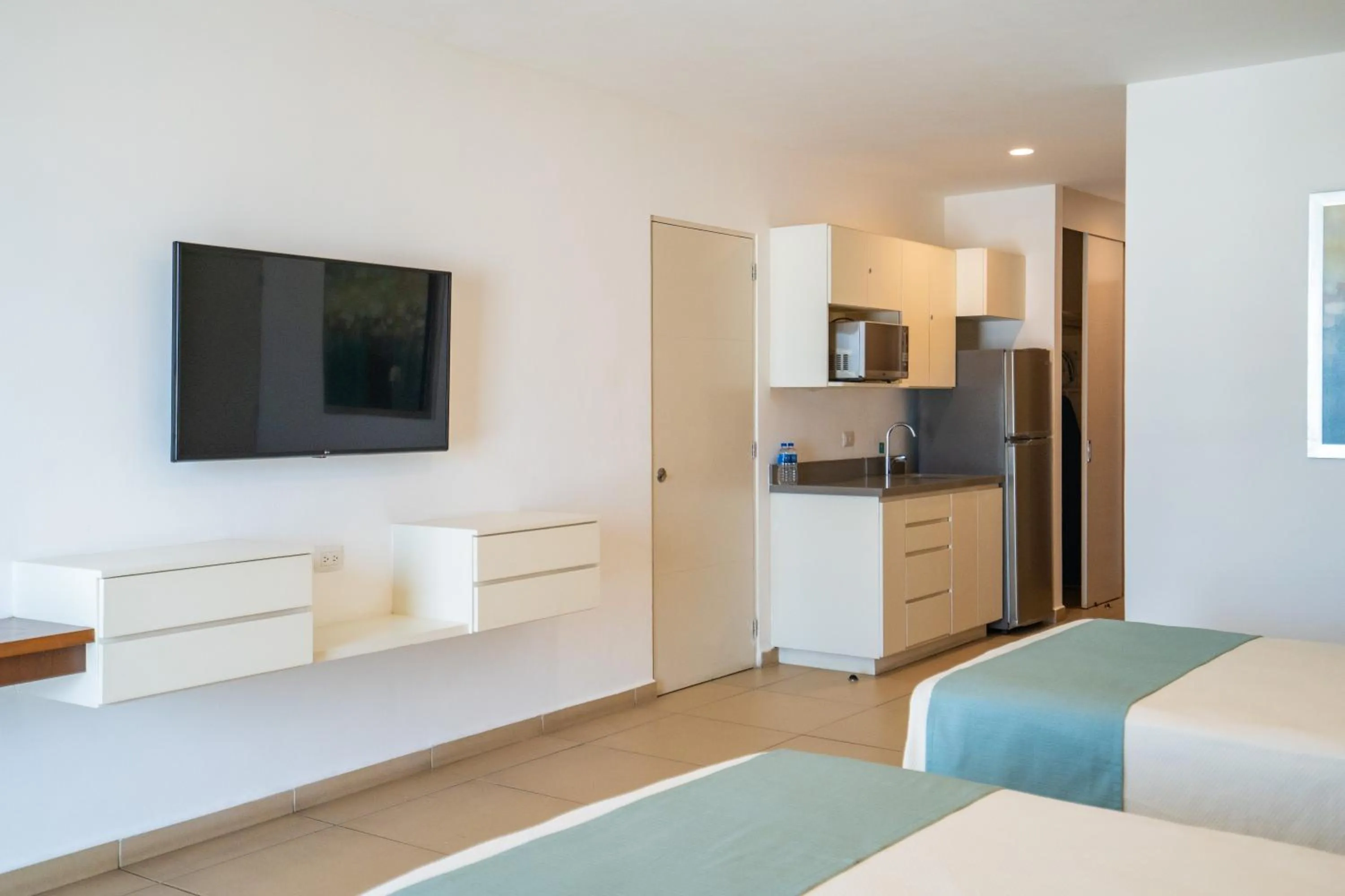 Photo of the whole room, Bed in Pacific Palace Beach Tower Hotel