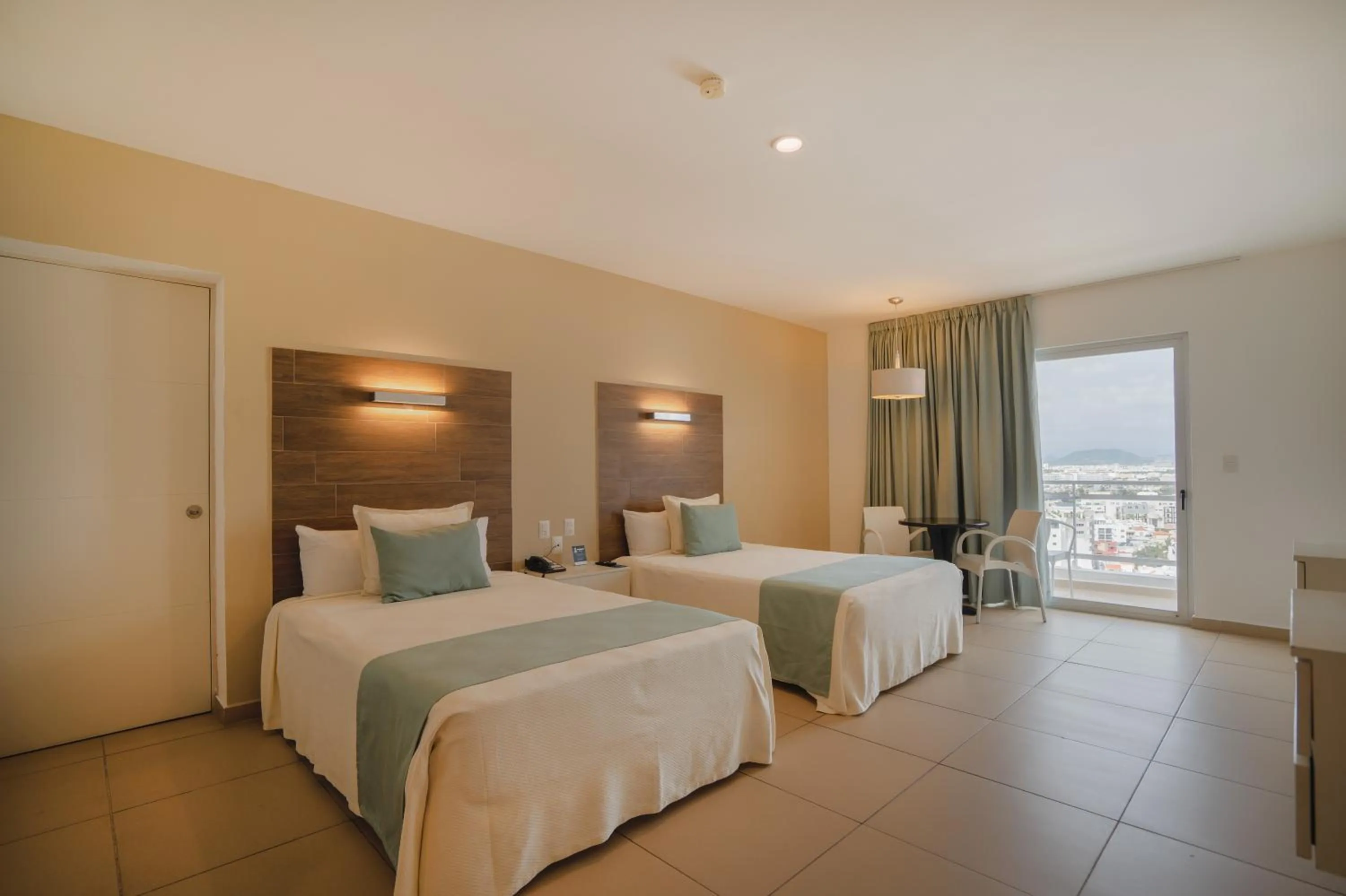 Photo of the whole room, Bed in Pacific Palace Beach Tower Hotel