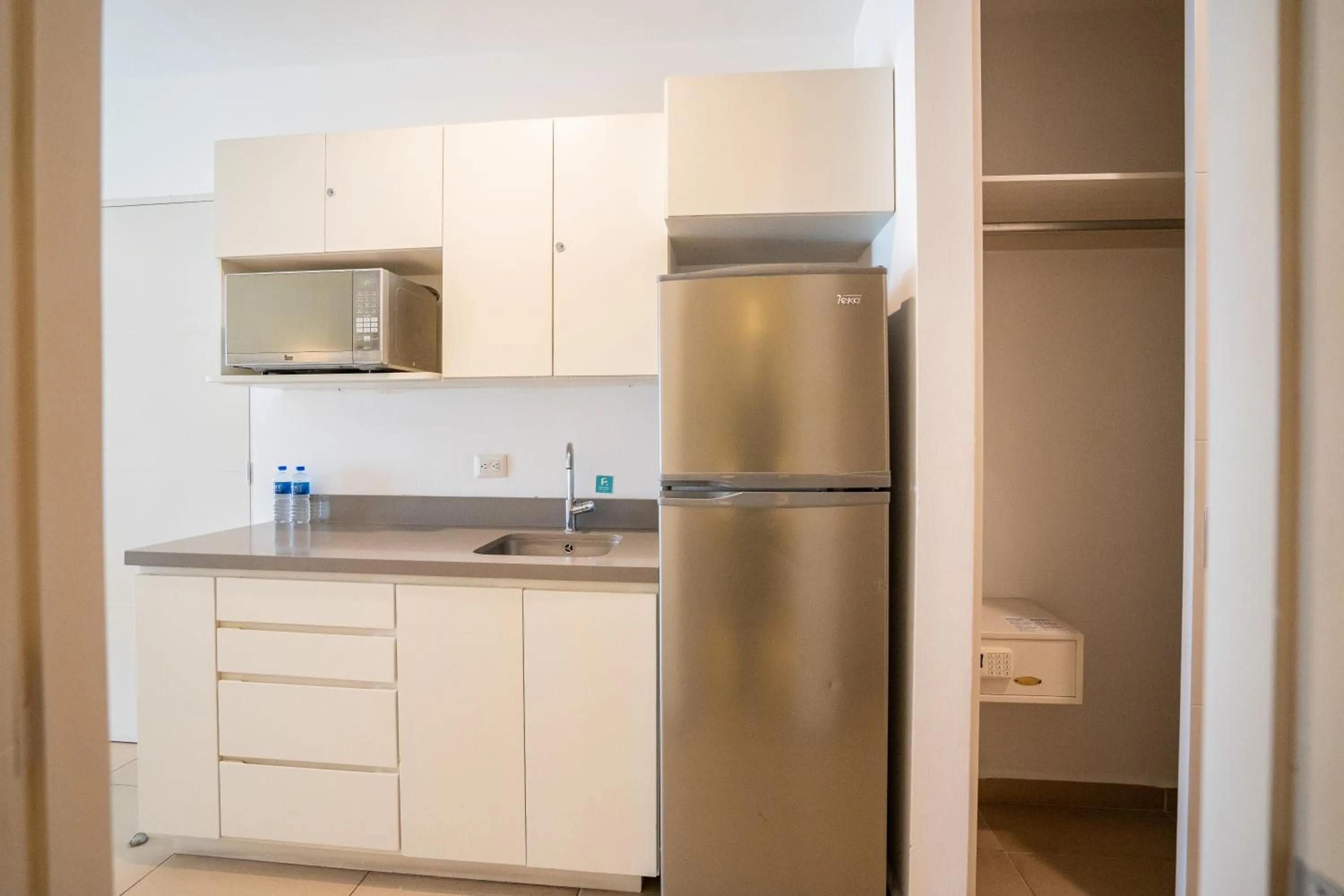 Kitchen or kitchenette in Pacific Palace Beach Tower Hotel