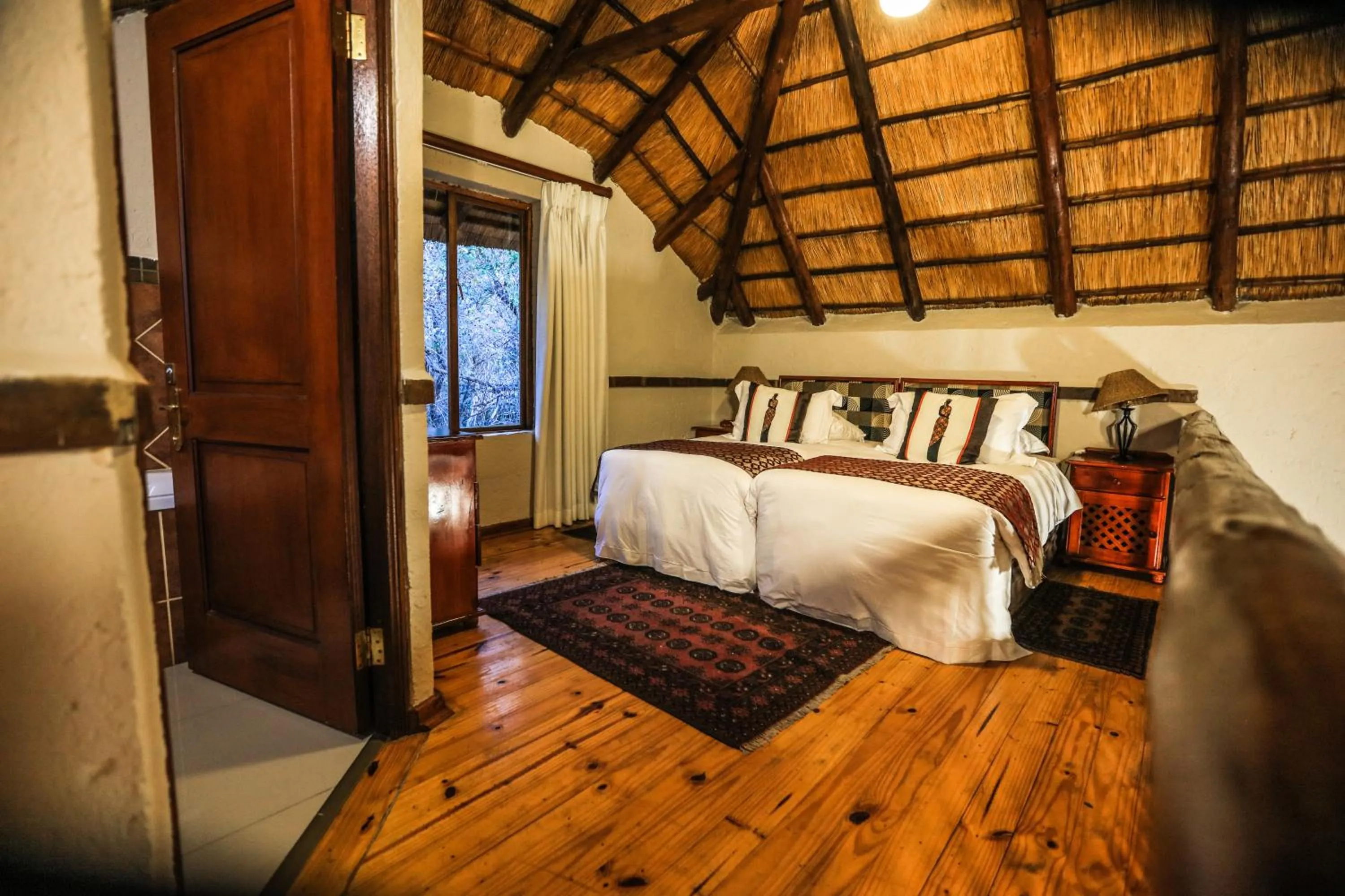 Bathroom, Bed in Grand Kruger Lodge and Spa