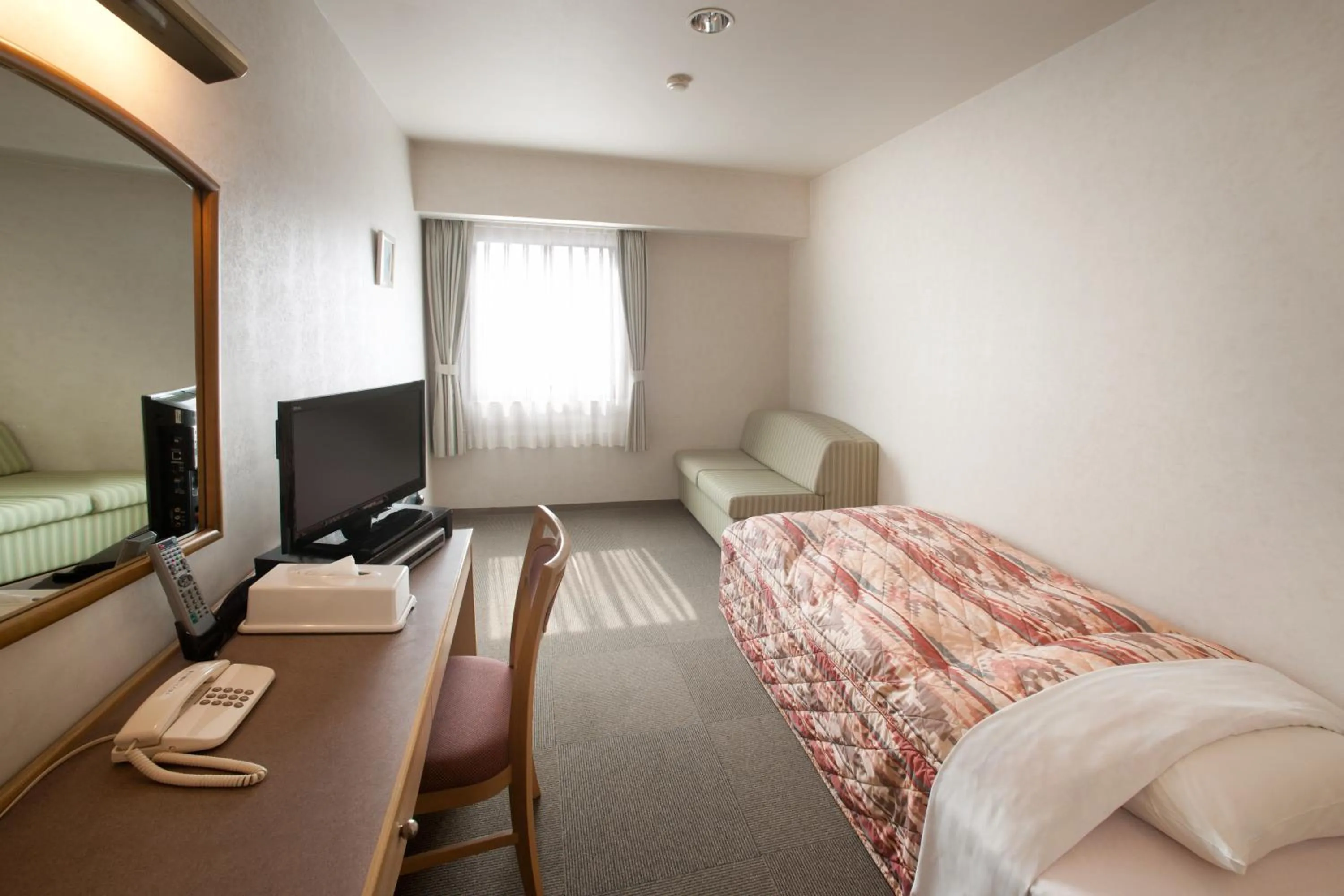 Photo of the whole room, Bed in Hotel Sunshine Tokushima