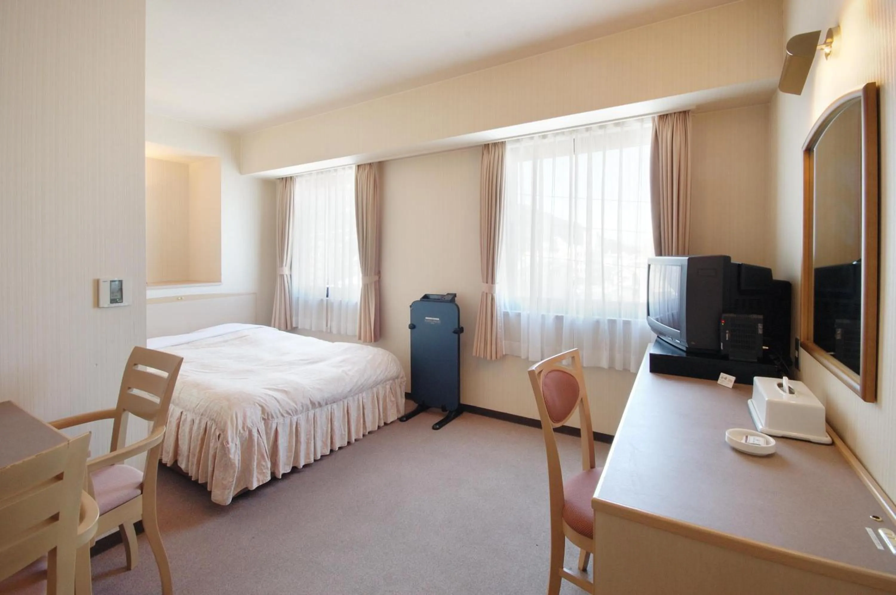 Photo of the whole room, Bed in Hotel Sunshine Tokushima