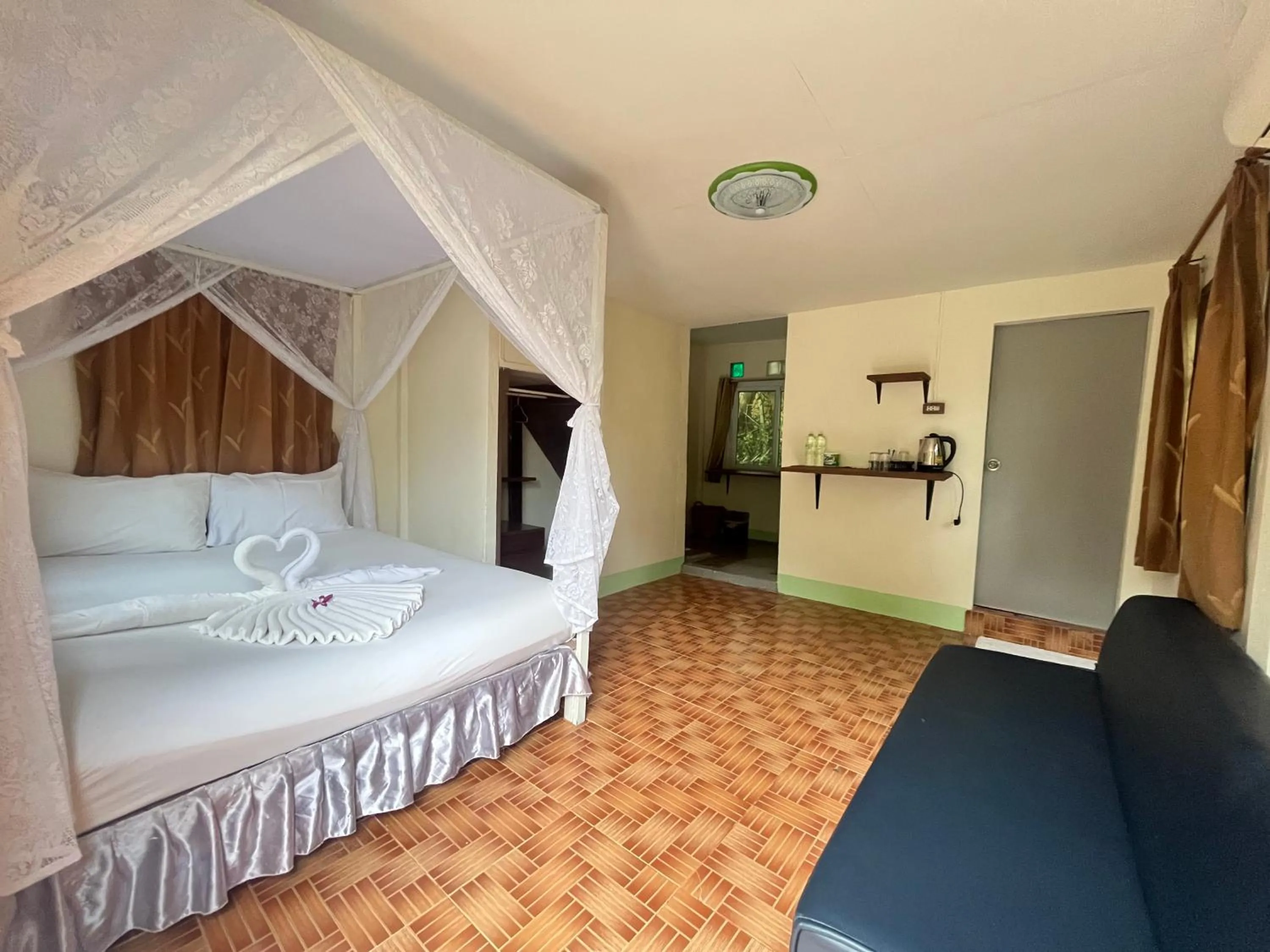 Bed in Koh Mook Garden Beach Resort