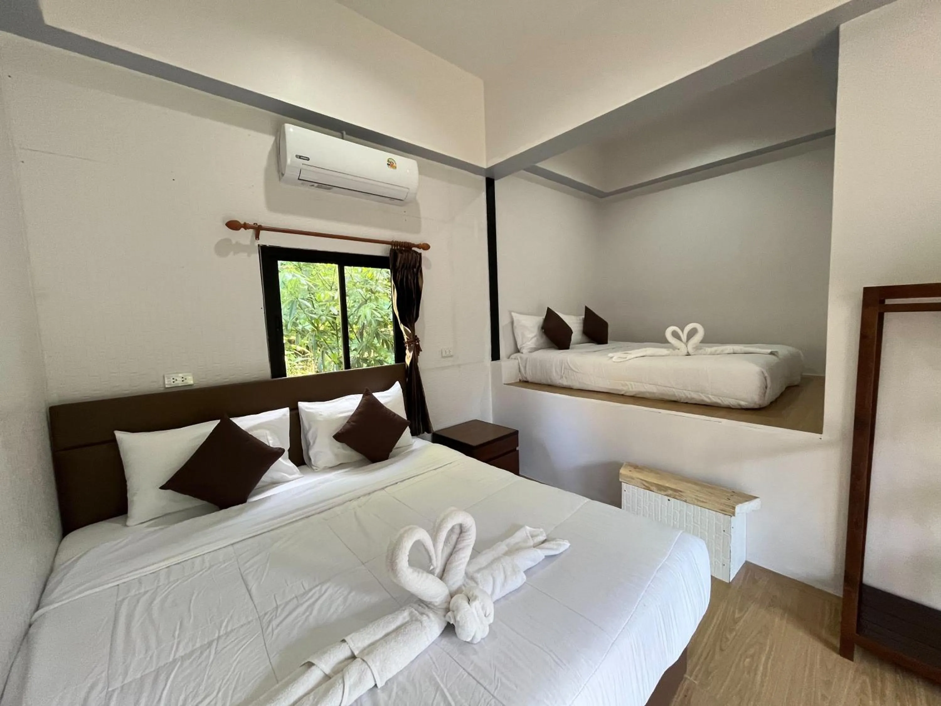 Bed in Koh Mook Garden Beach Resort