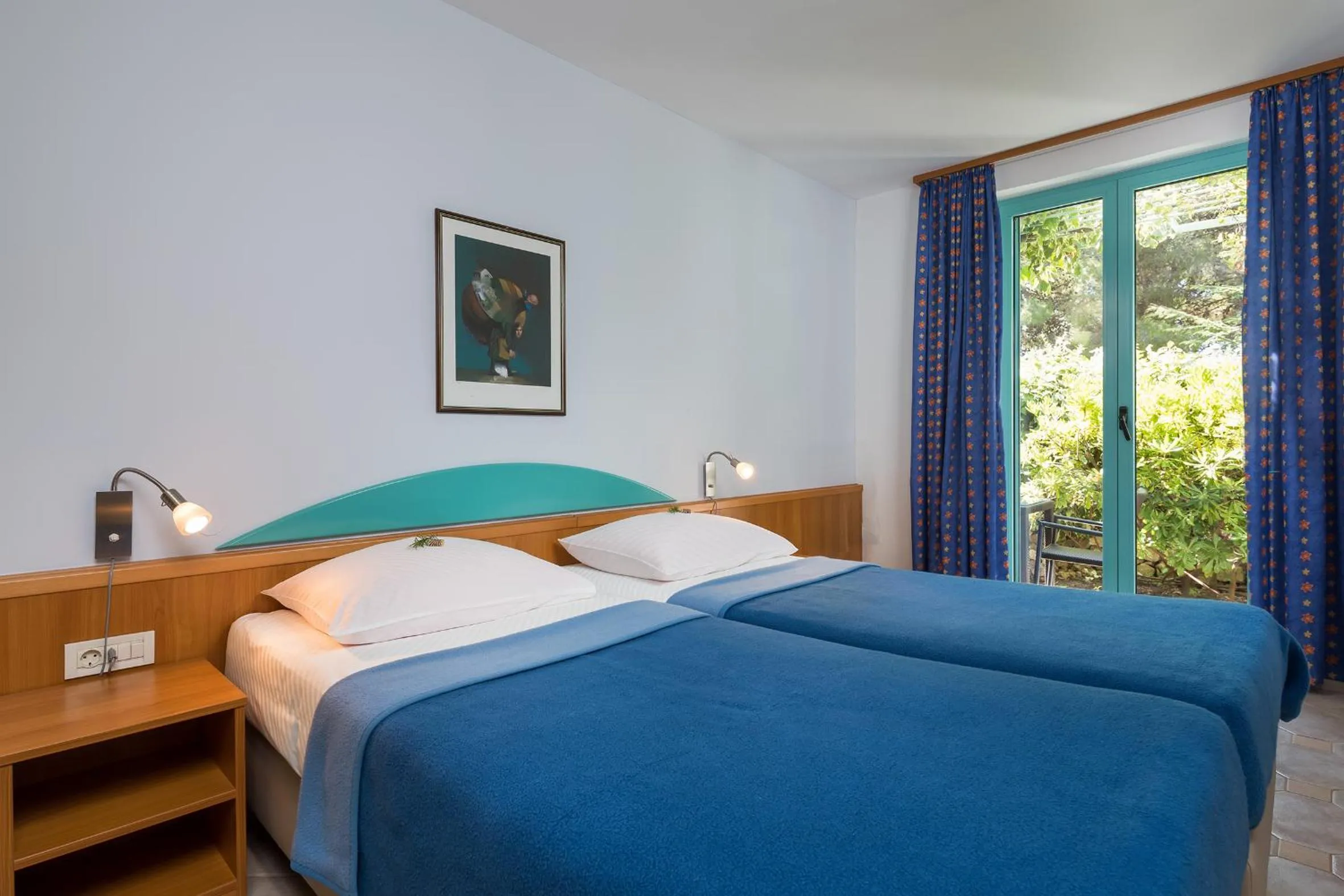 Bed in BRETANIDE Sport & Wellness Resort - All Inclusive