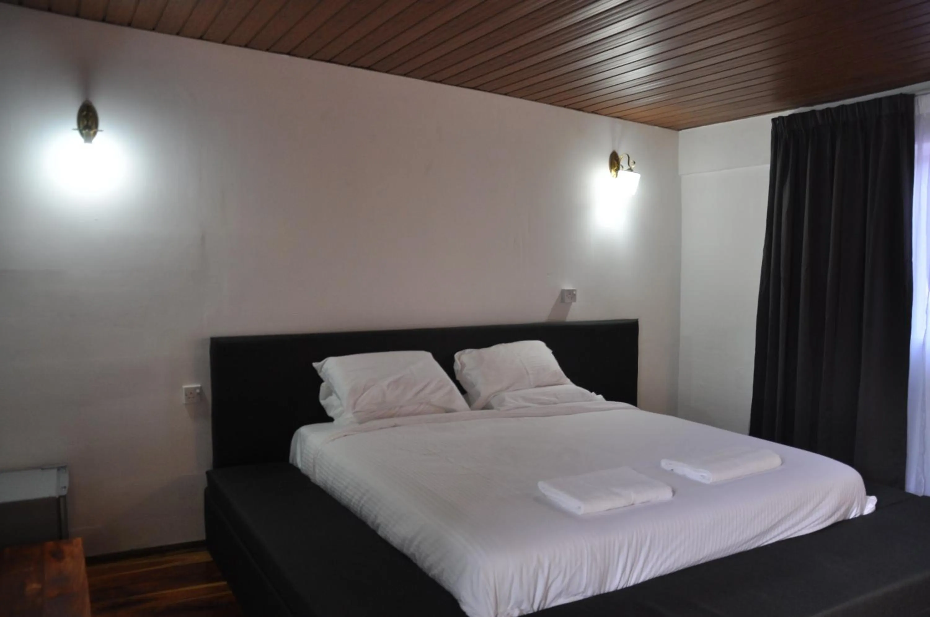 Bed in Joe Fisherman Inn