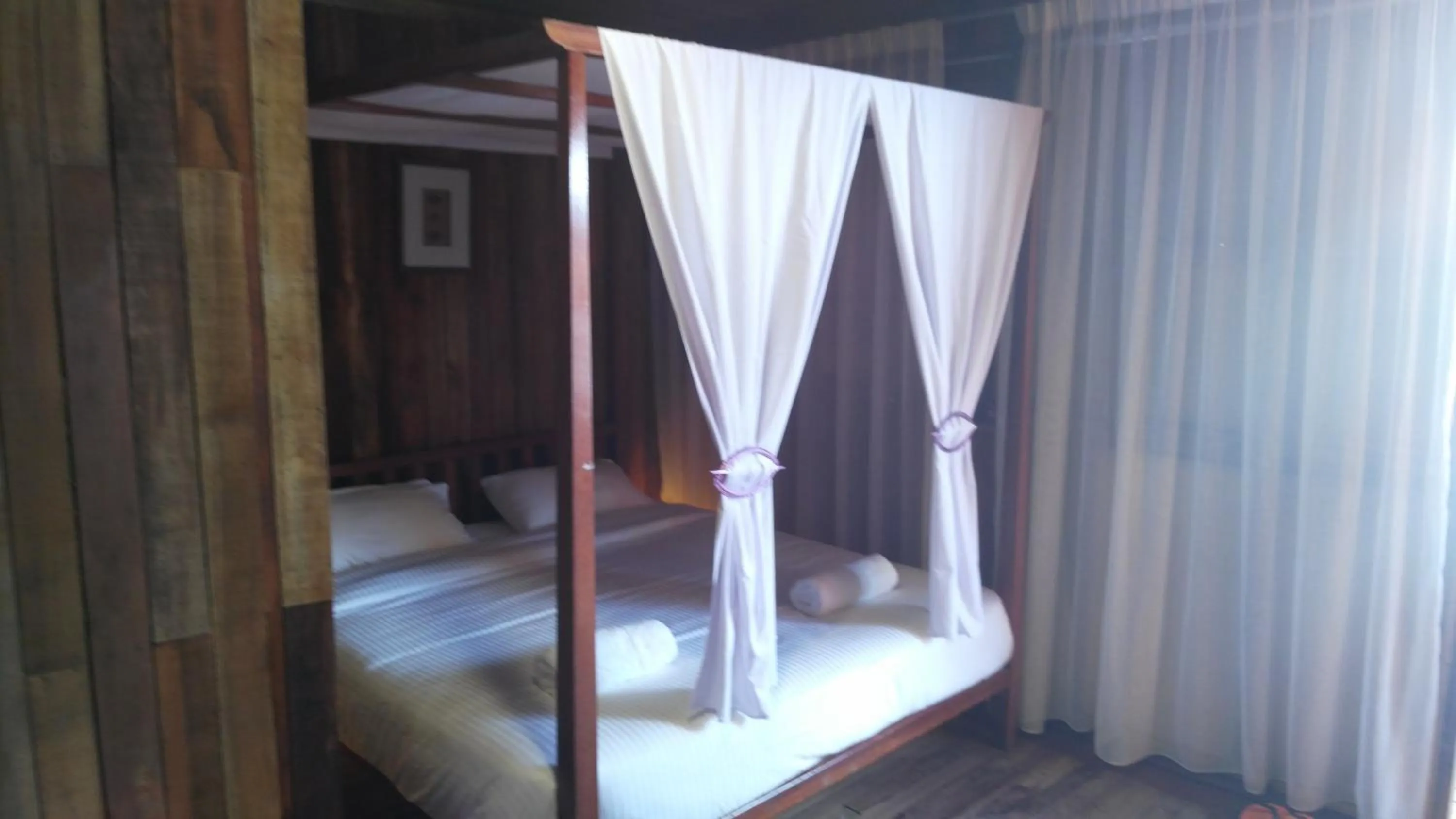 Bed in Joe Fisherman Inn