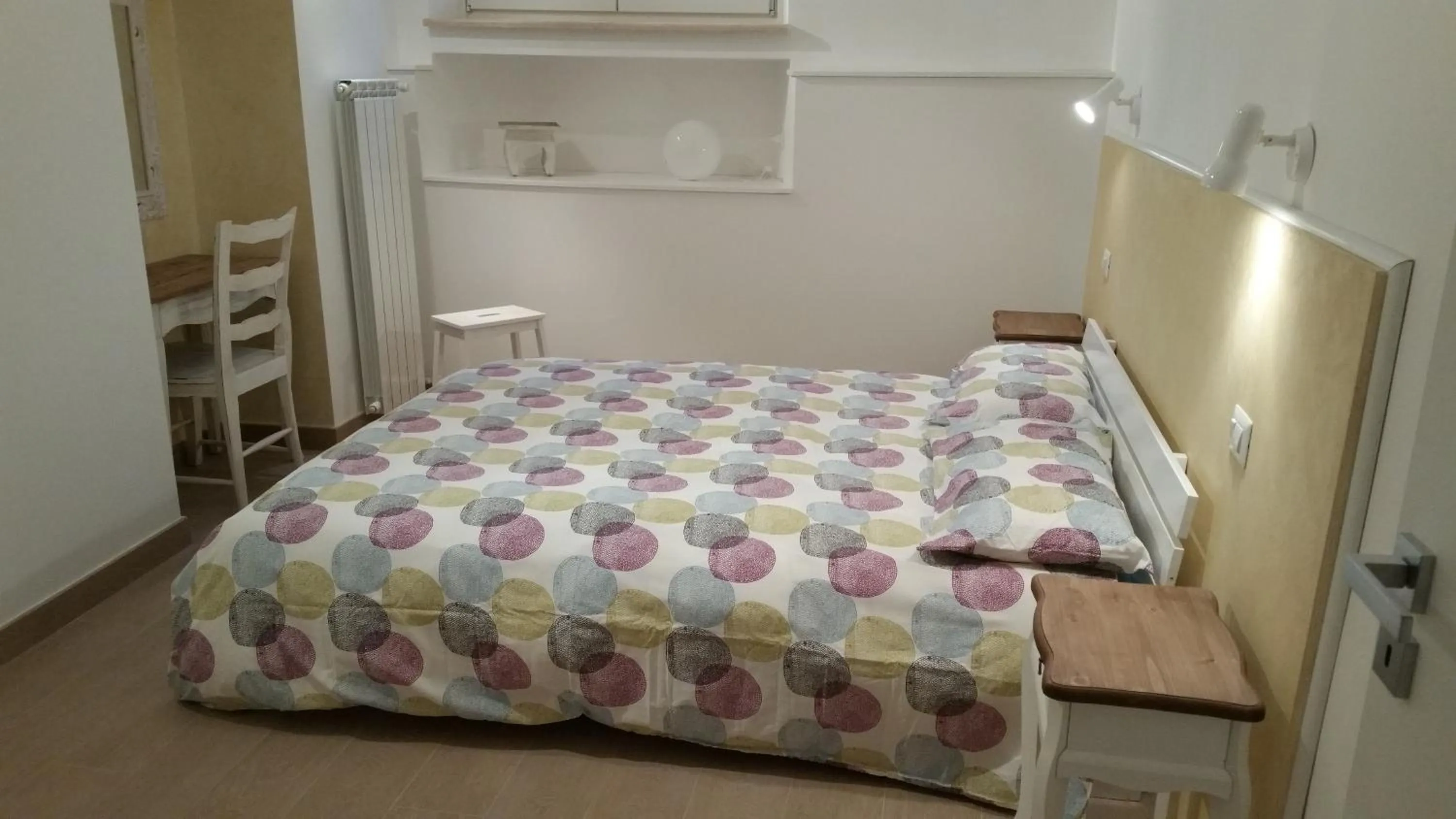 Photo of the whole room, Bed in La Casetta di Ely