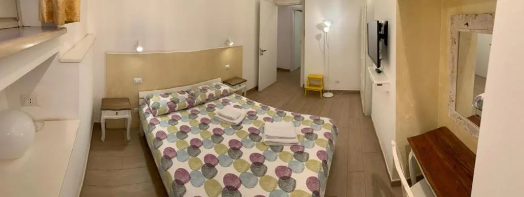 Photo of the whole room, Bed in La Casetta di Ely