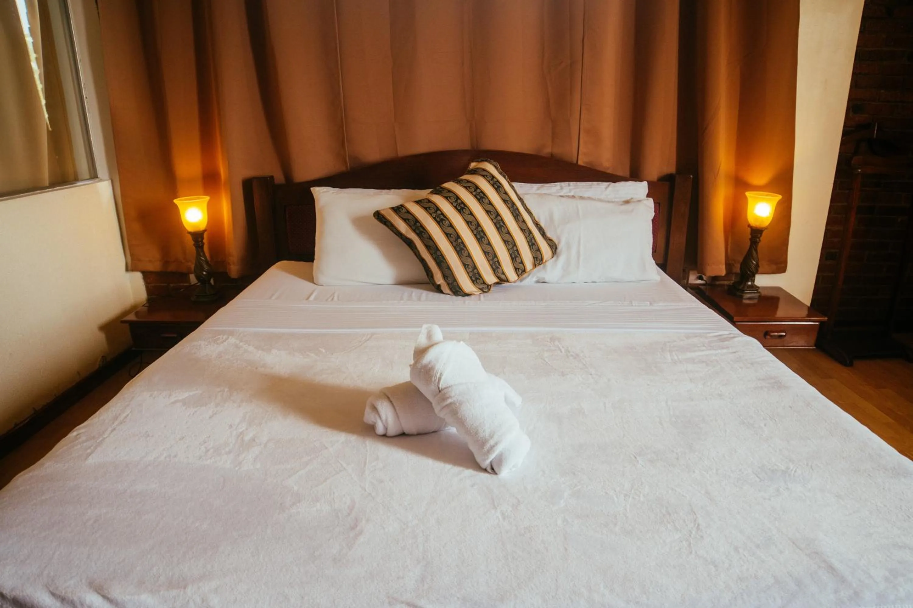 Bed in Marina Palawan Boutique Nature Resort