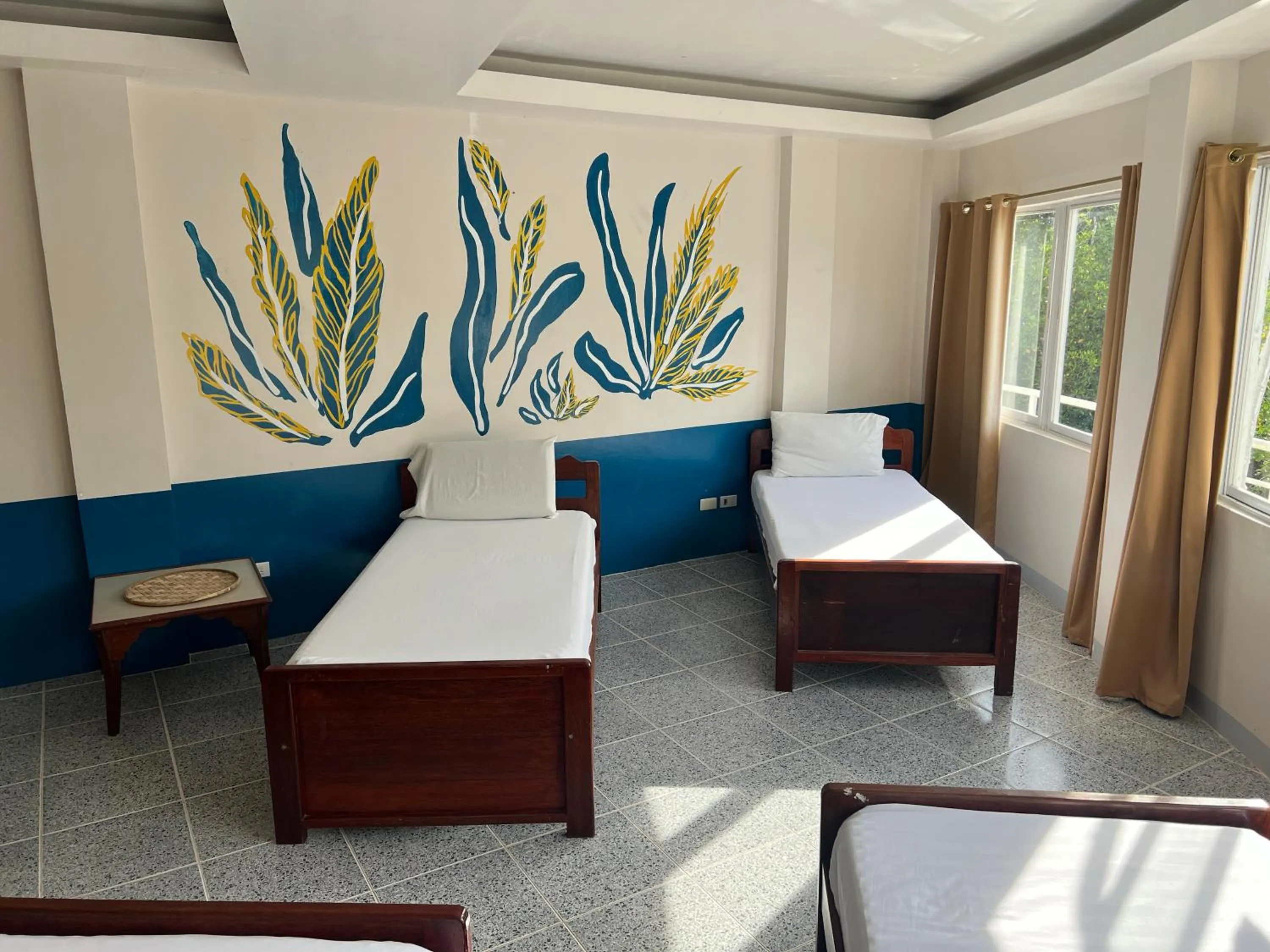 Bed in Marina Palawan Boutique Nature Resort